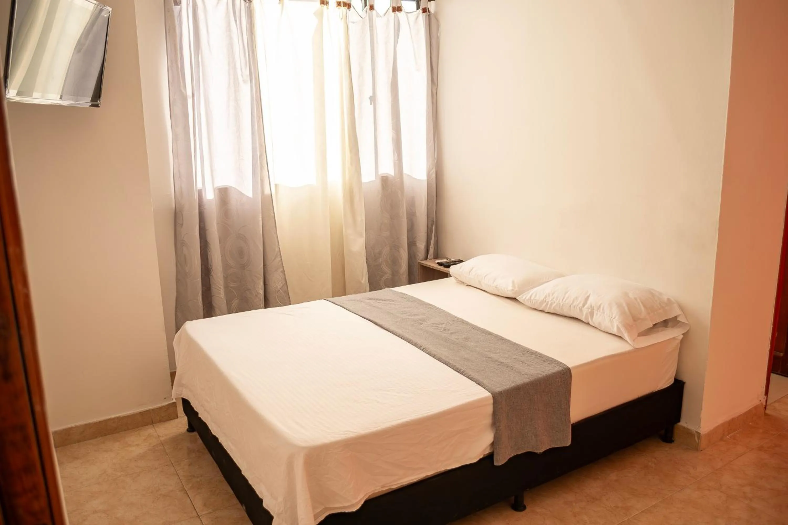 Bed in Hotel Santander Plaza