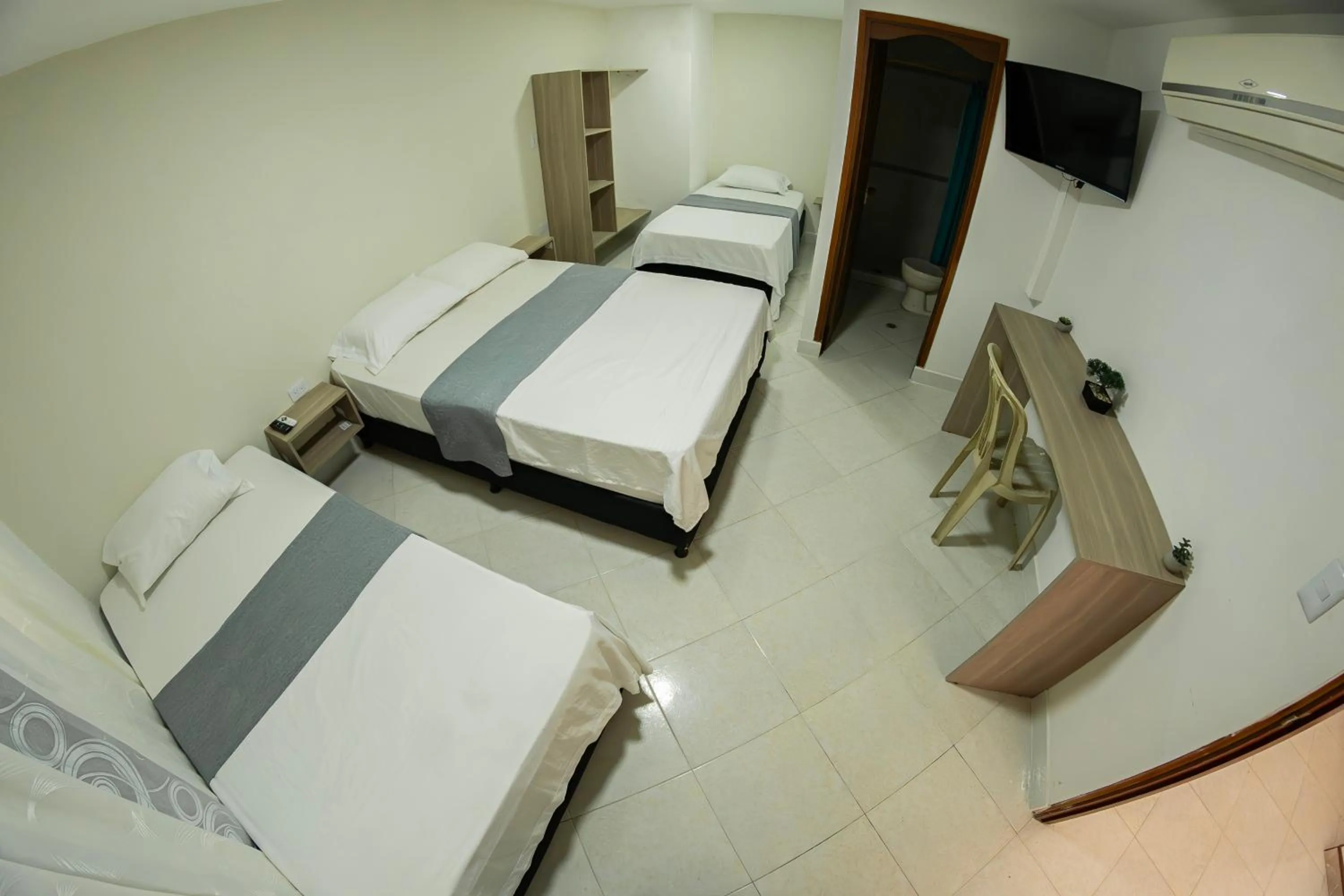 Bed in Hotel Santander Plaza