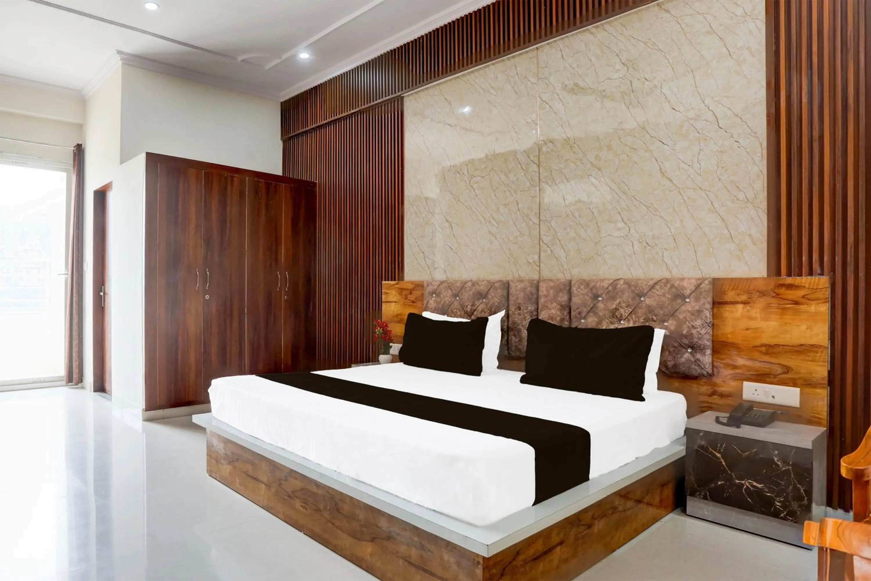 Bedroom in Hotel O BGM