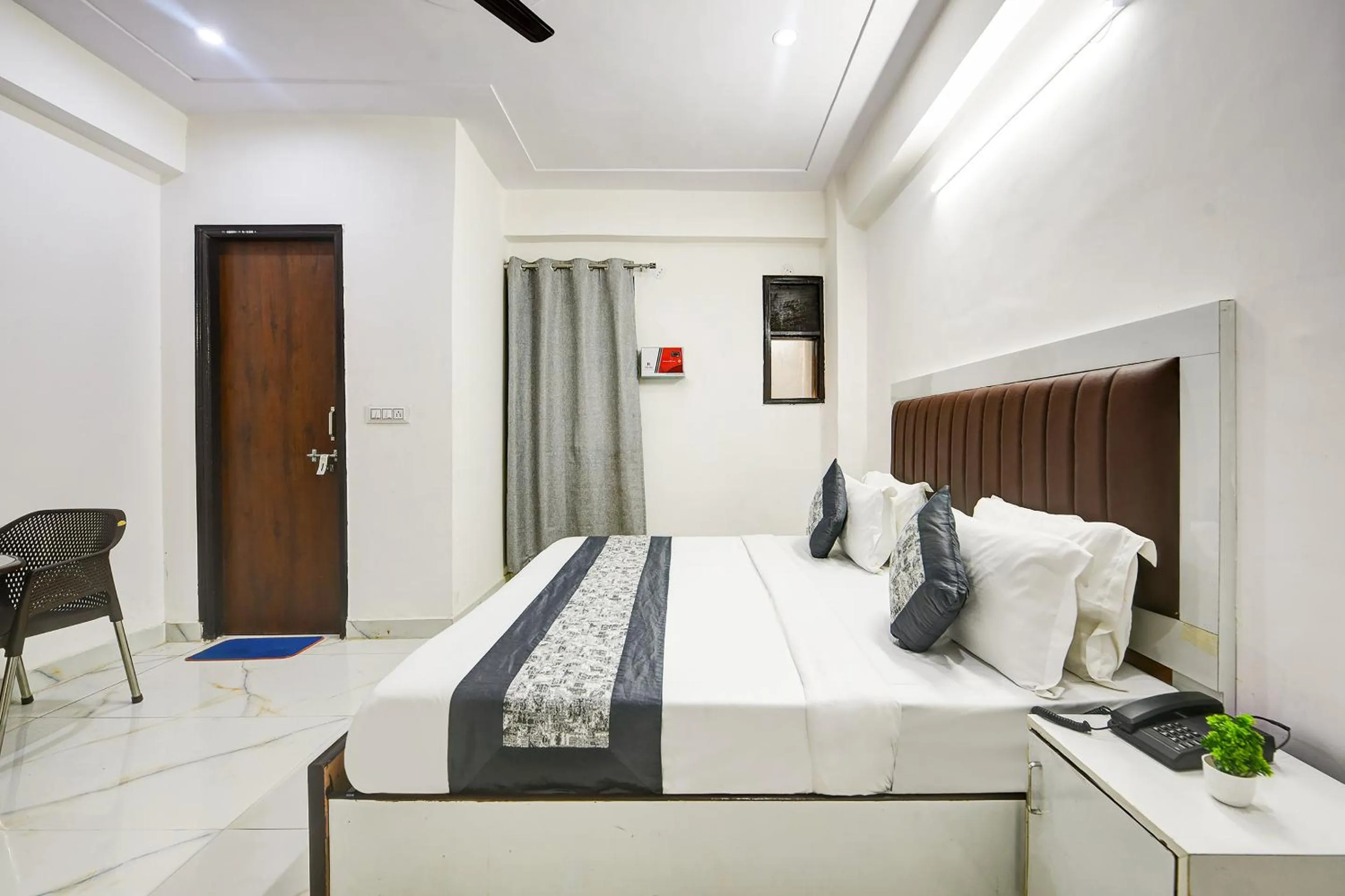 Bed in Hotel Krishna Tower