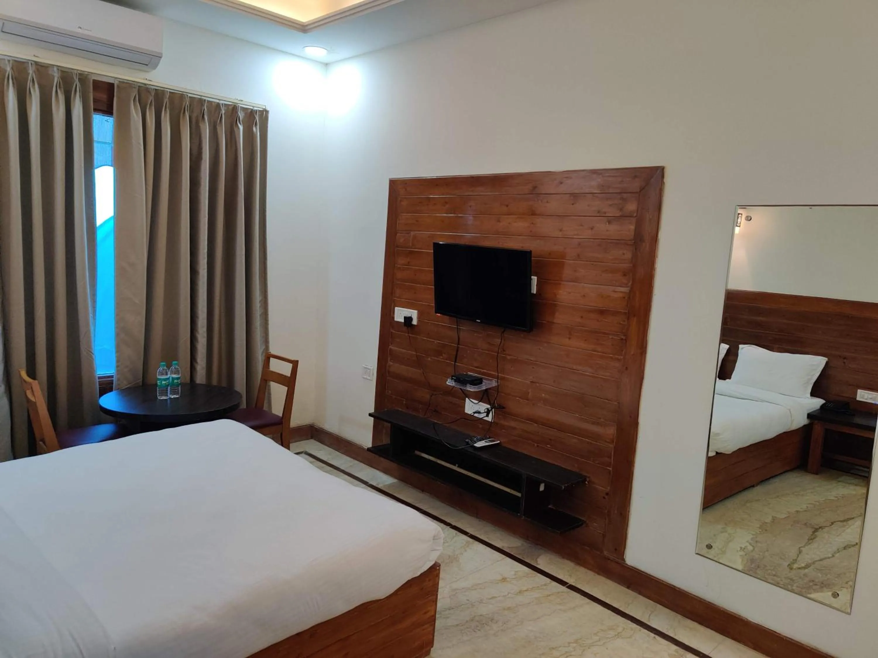 Bedroom, Bed in Orchha Club and Resort - OCR