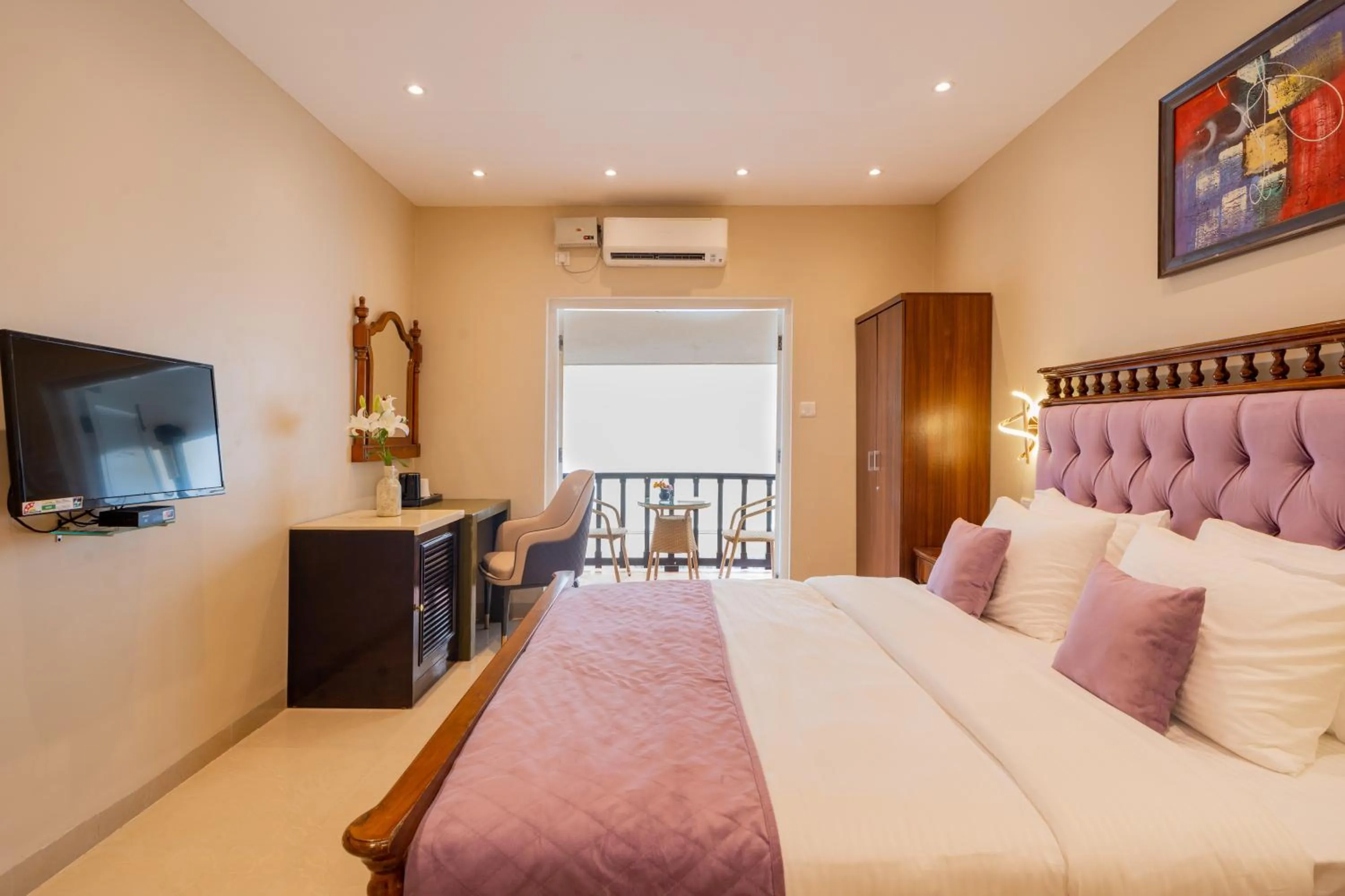 Communal lounge/ TV room, Bed in Emperor Ozran by Alaya Stays