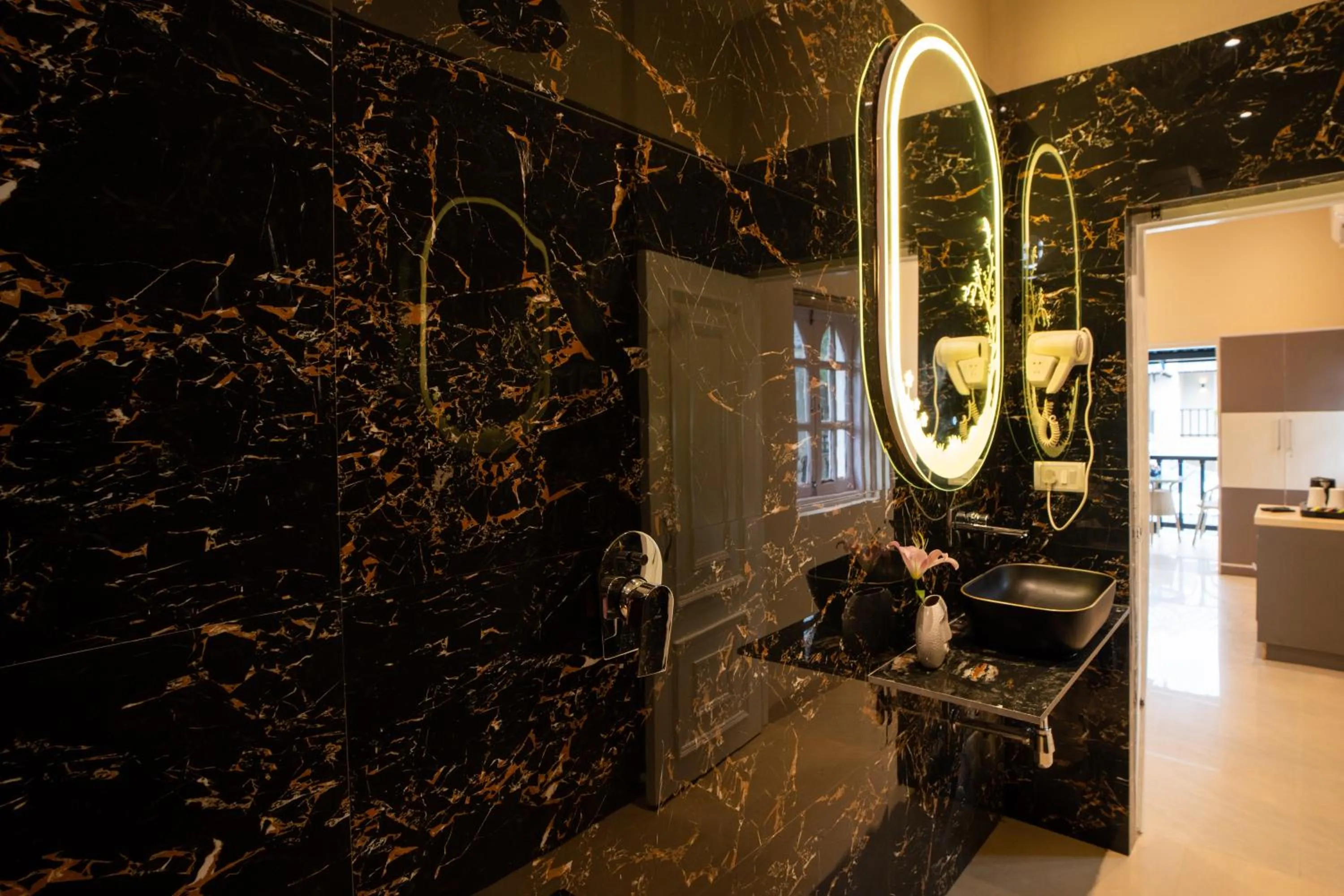 Bathroom in Emperor Ozran by Alaya Stays