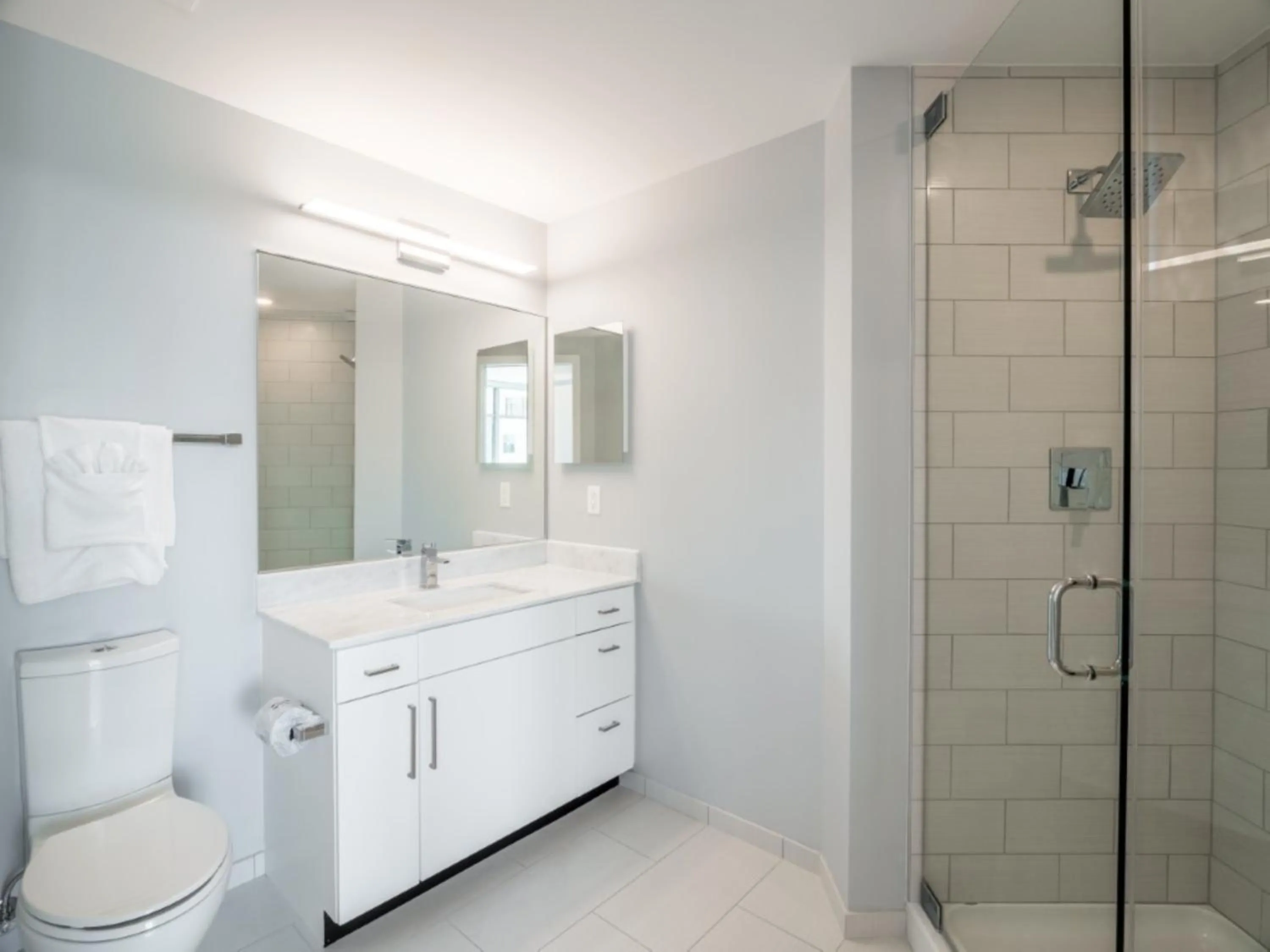 Shower in Global Luxury Suites Bethesda Chevy Chase