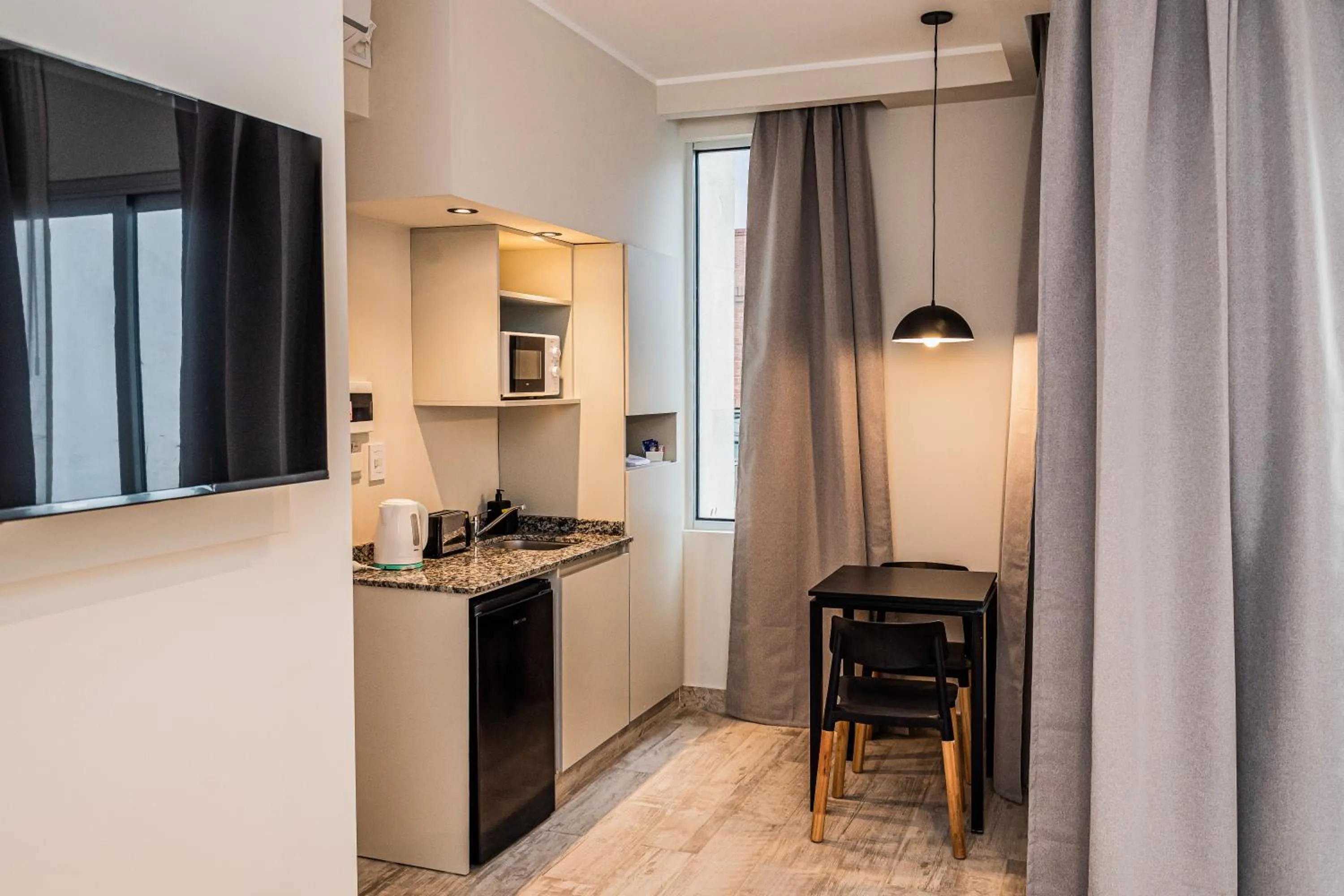 Kitchen or kitchenette in RentUp Suites Salta