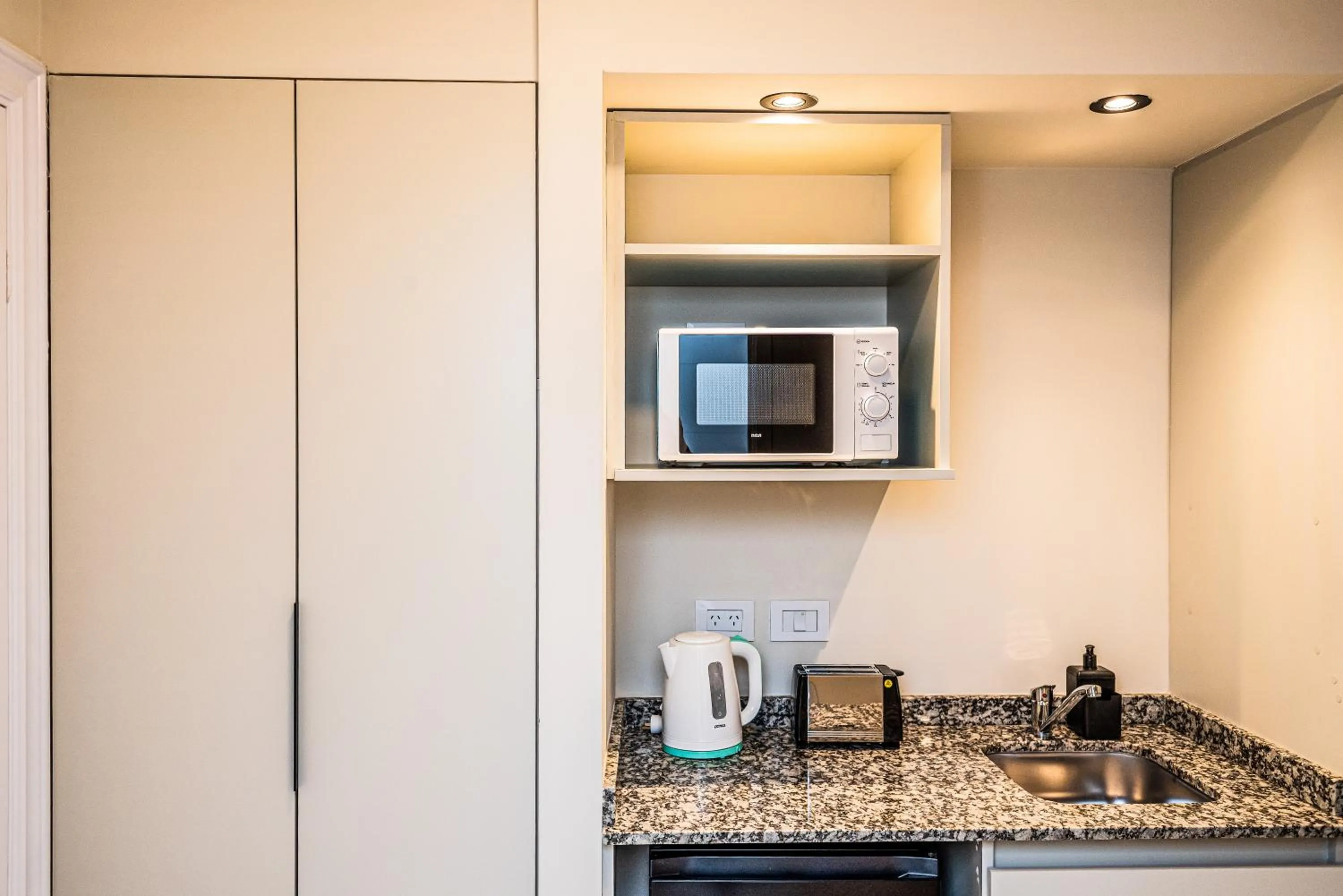 Kitchen or kitchenette in RentUp Suites Salta