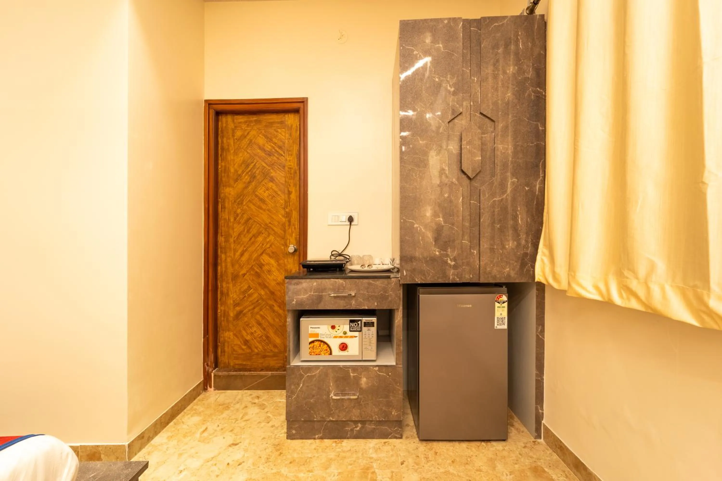 Kitchen or kitchenette in Seasons Suites - HBR