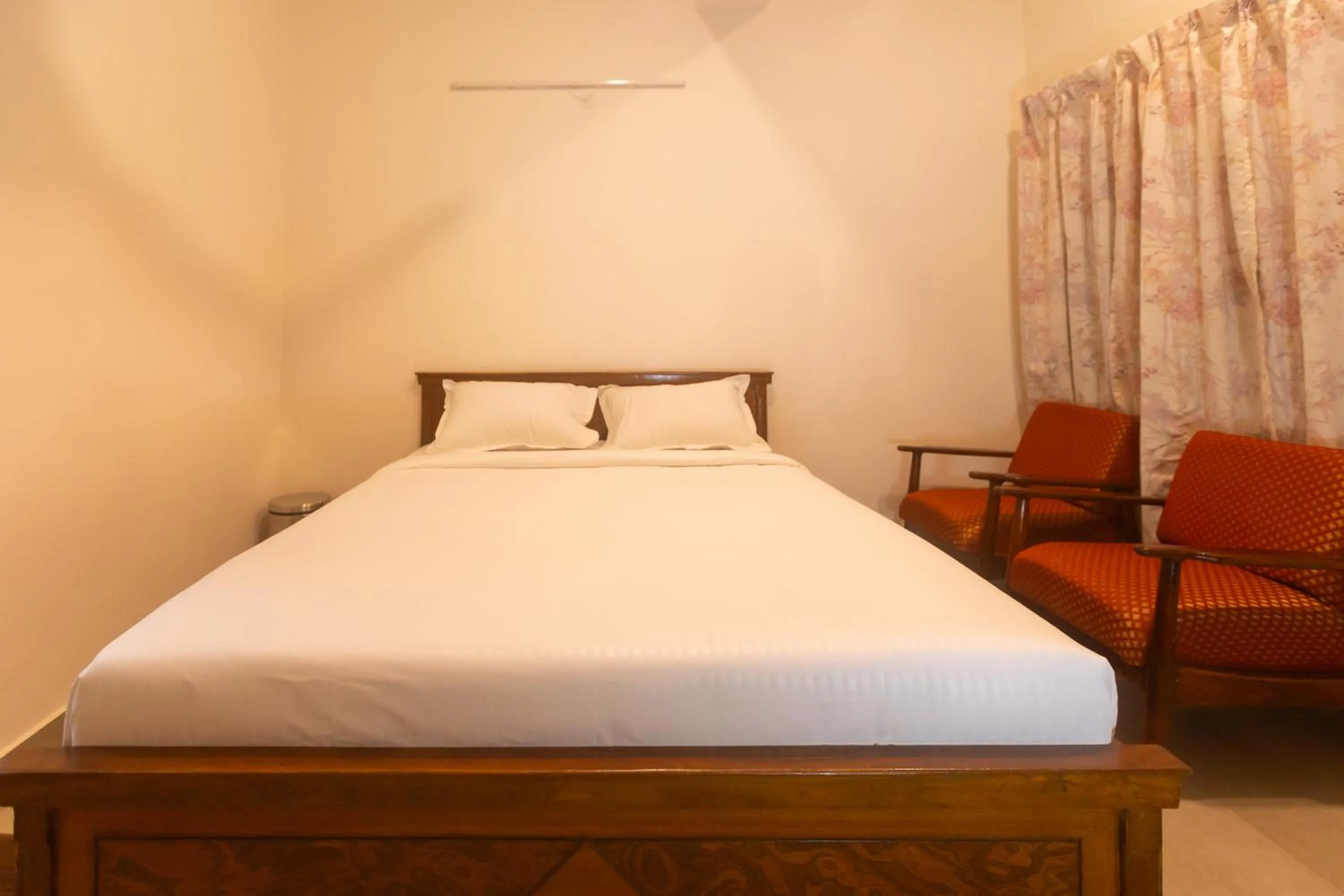 Bed in Sri Ramakrishna Hotel