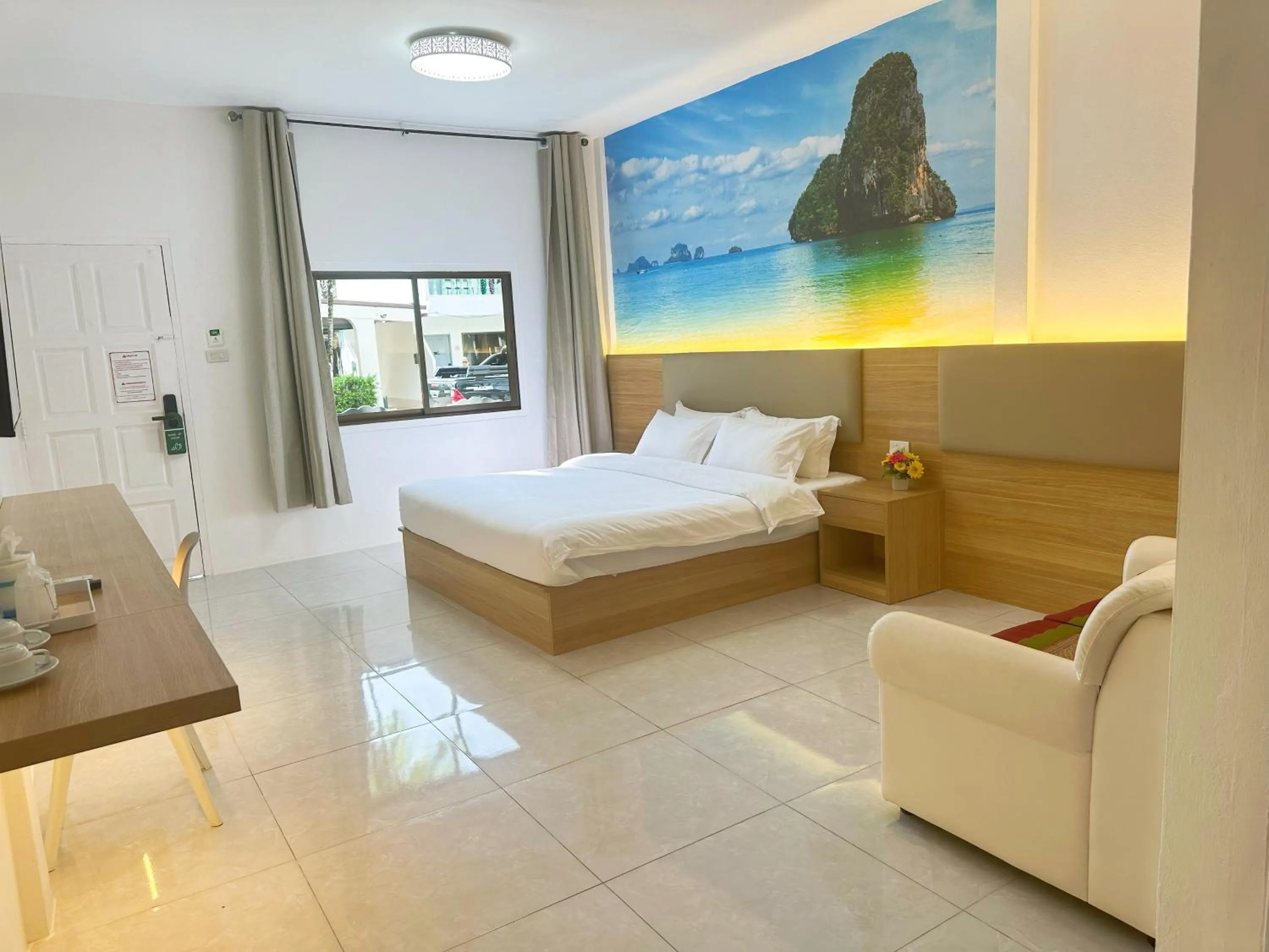 Photo of the whole room, Bed in The coconut nanai resort