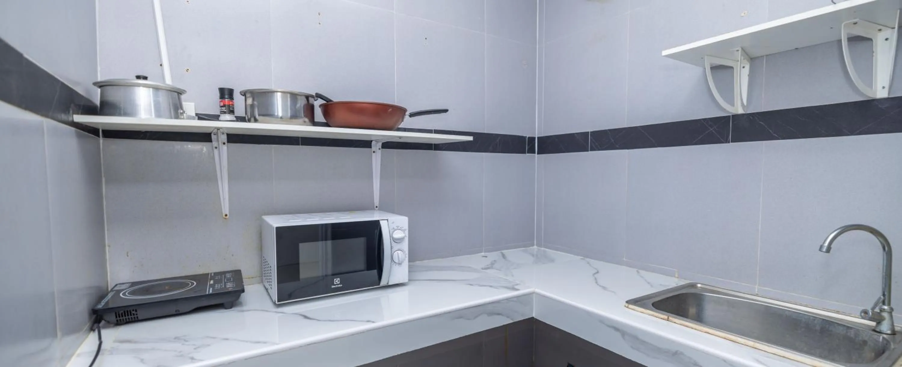 Kitchen or kitchenette in The coconut nanai resort