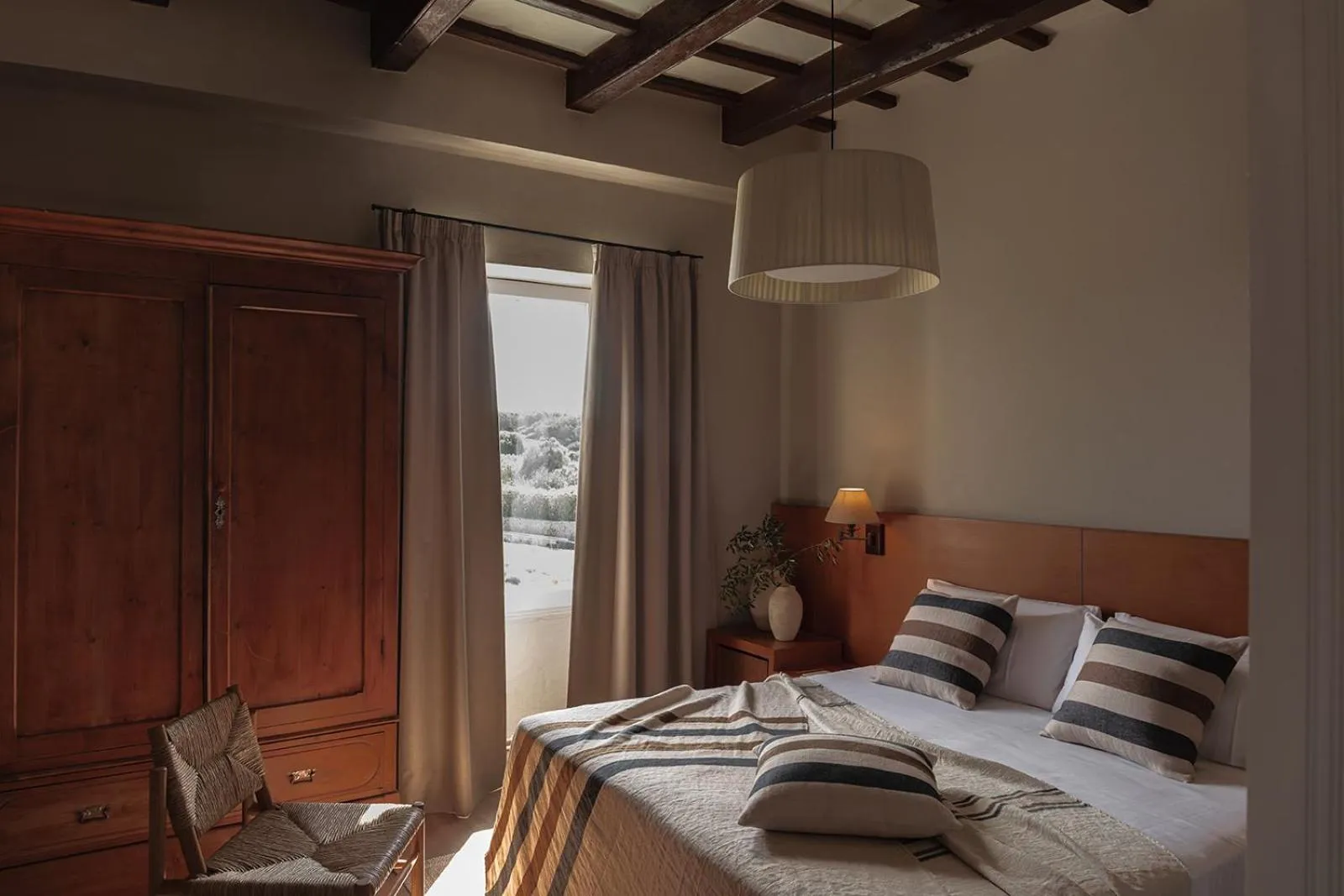 Bed in Binissaida Boutique Hotel