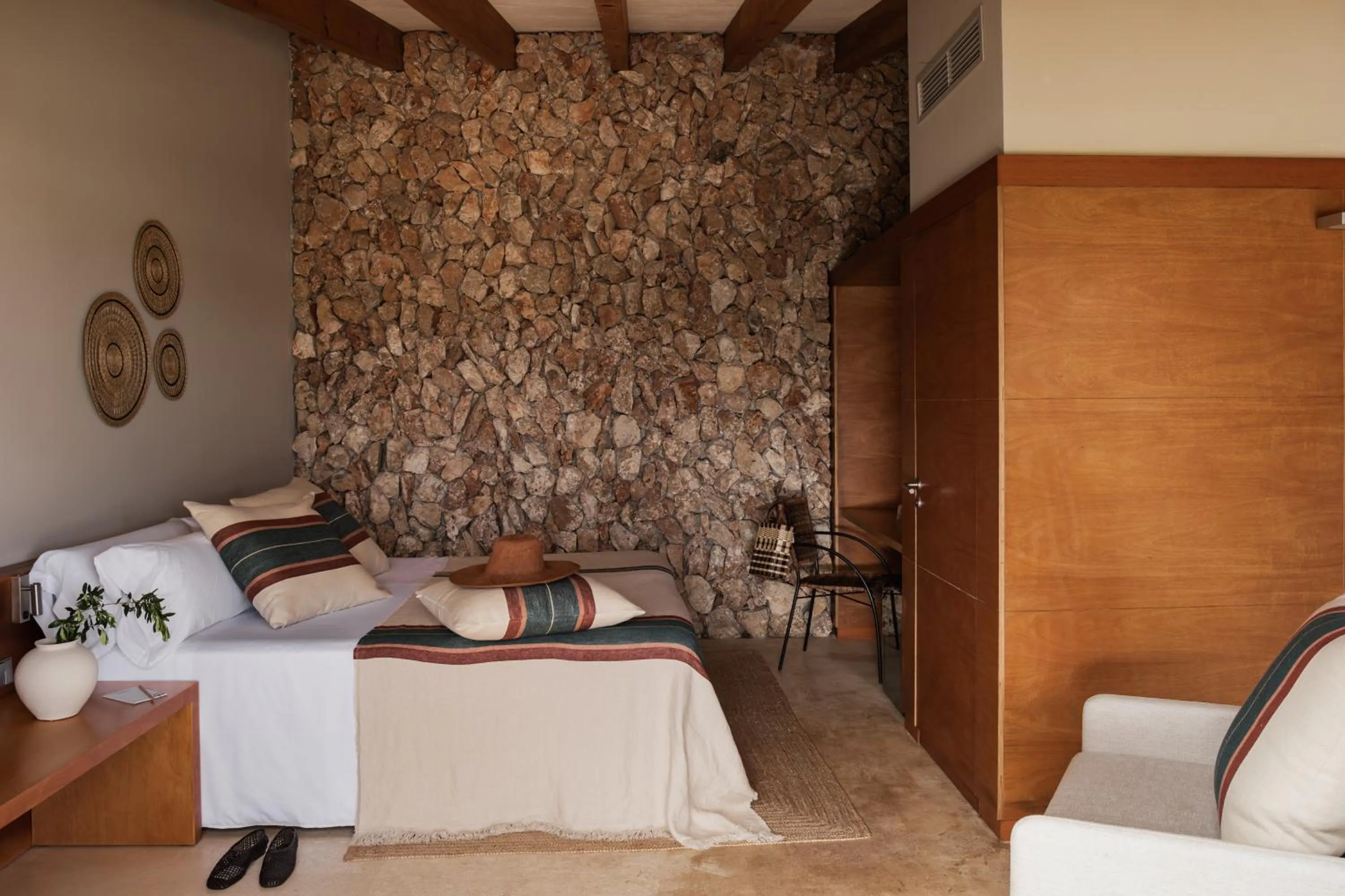 Bed in Binissaida Boutique Hotel