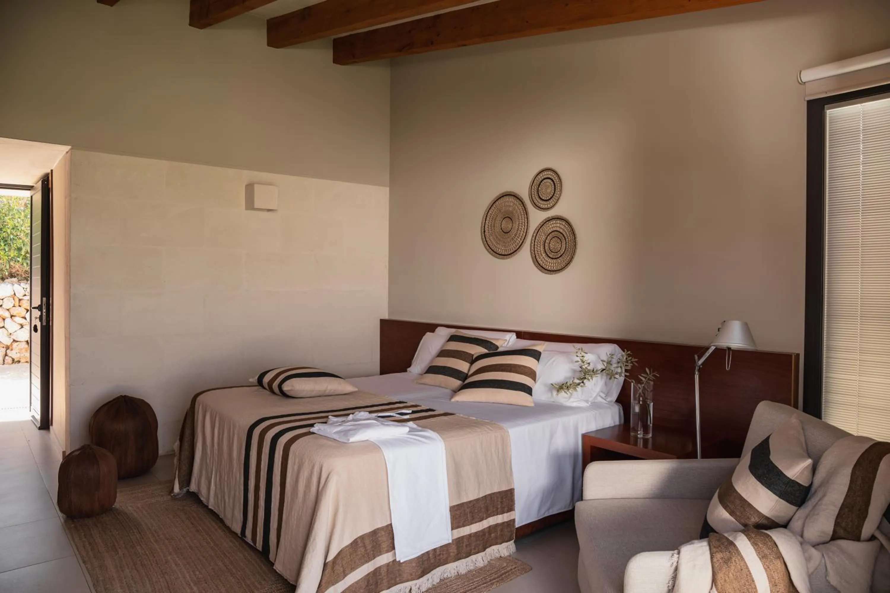 Bed in Binissaida Boutique Hotel