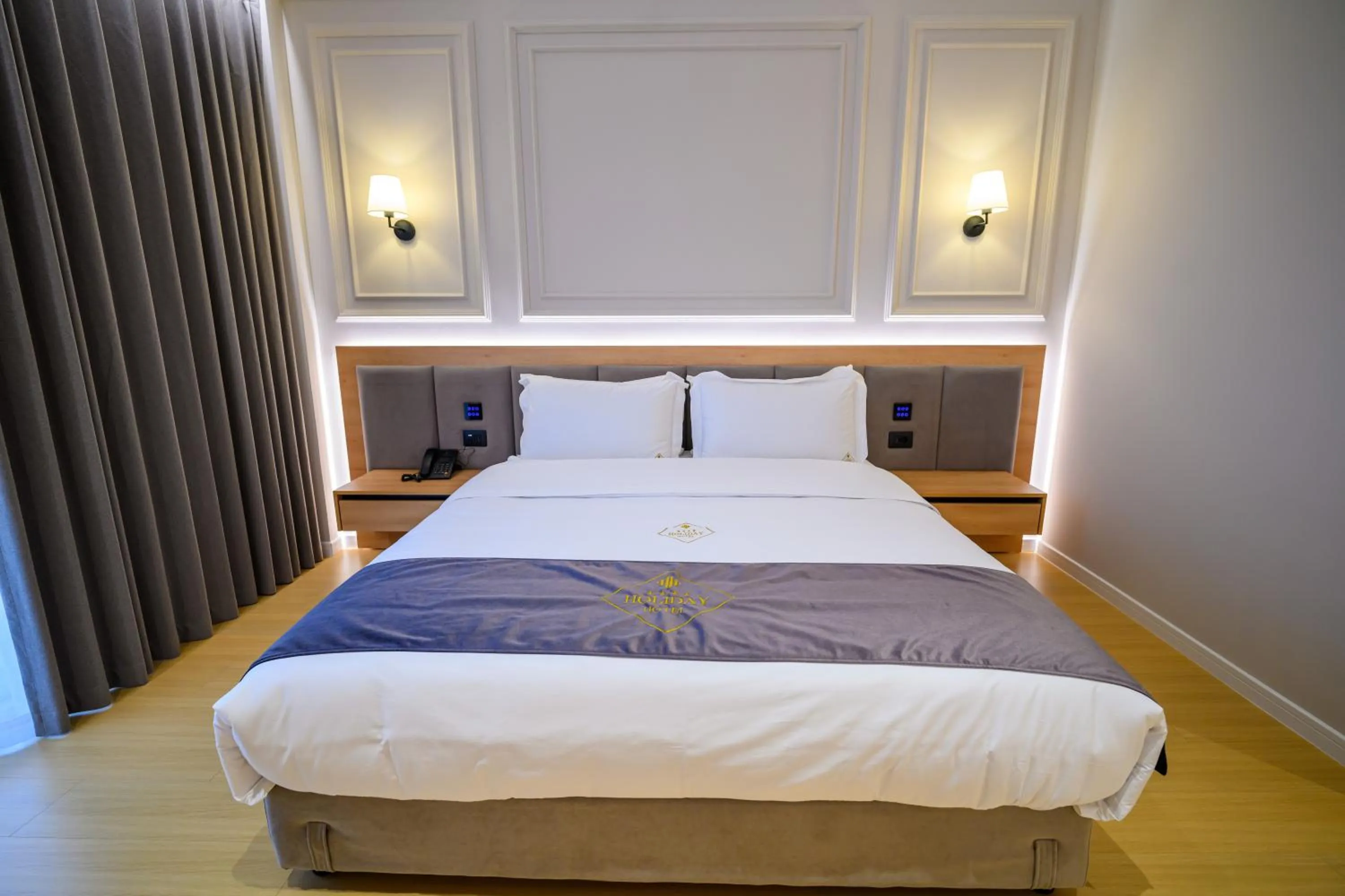 Bed in Holiday Hotel