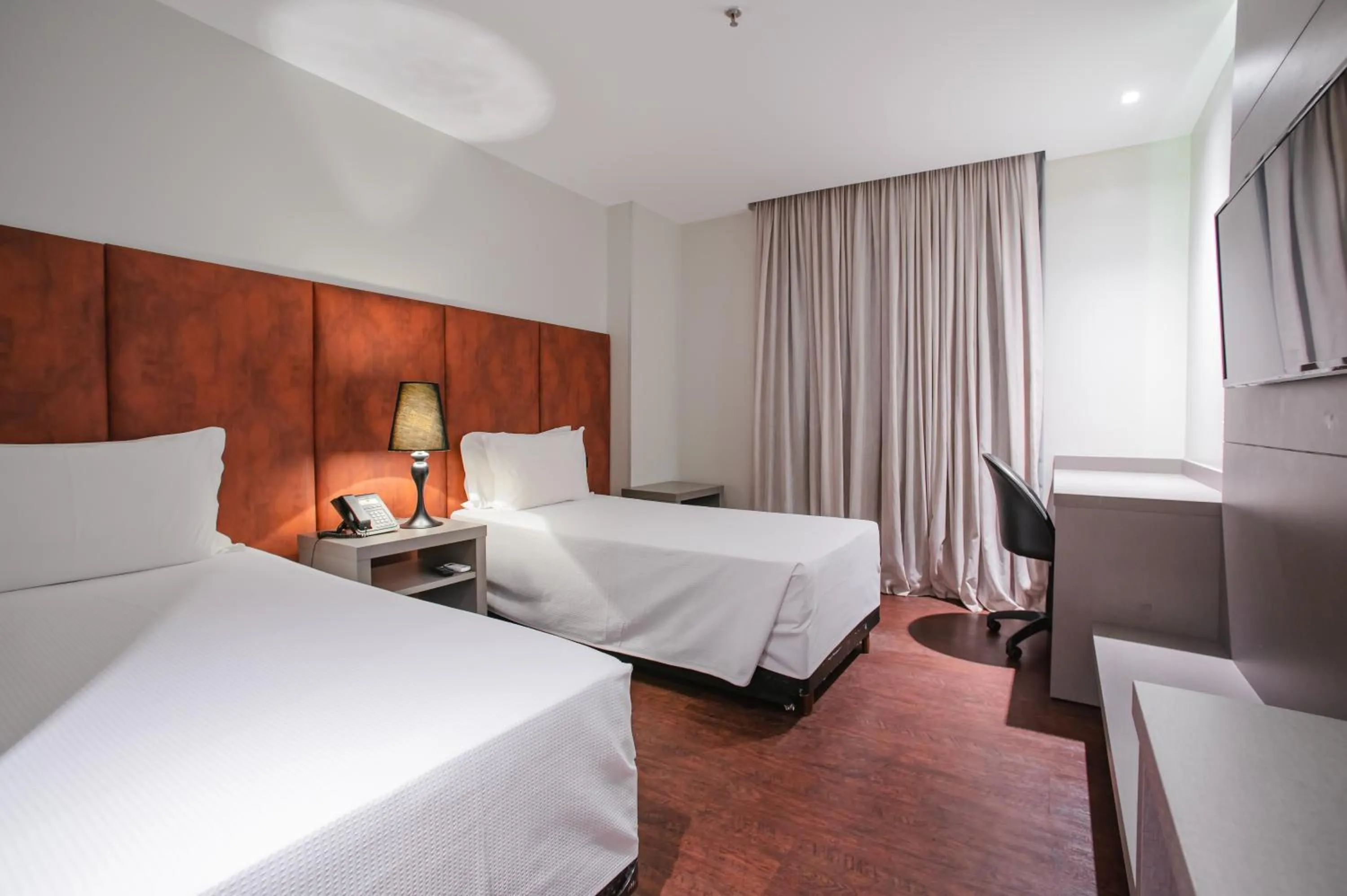 Bed in Brut by Slaviero Hotéis