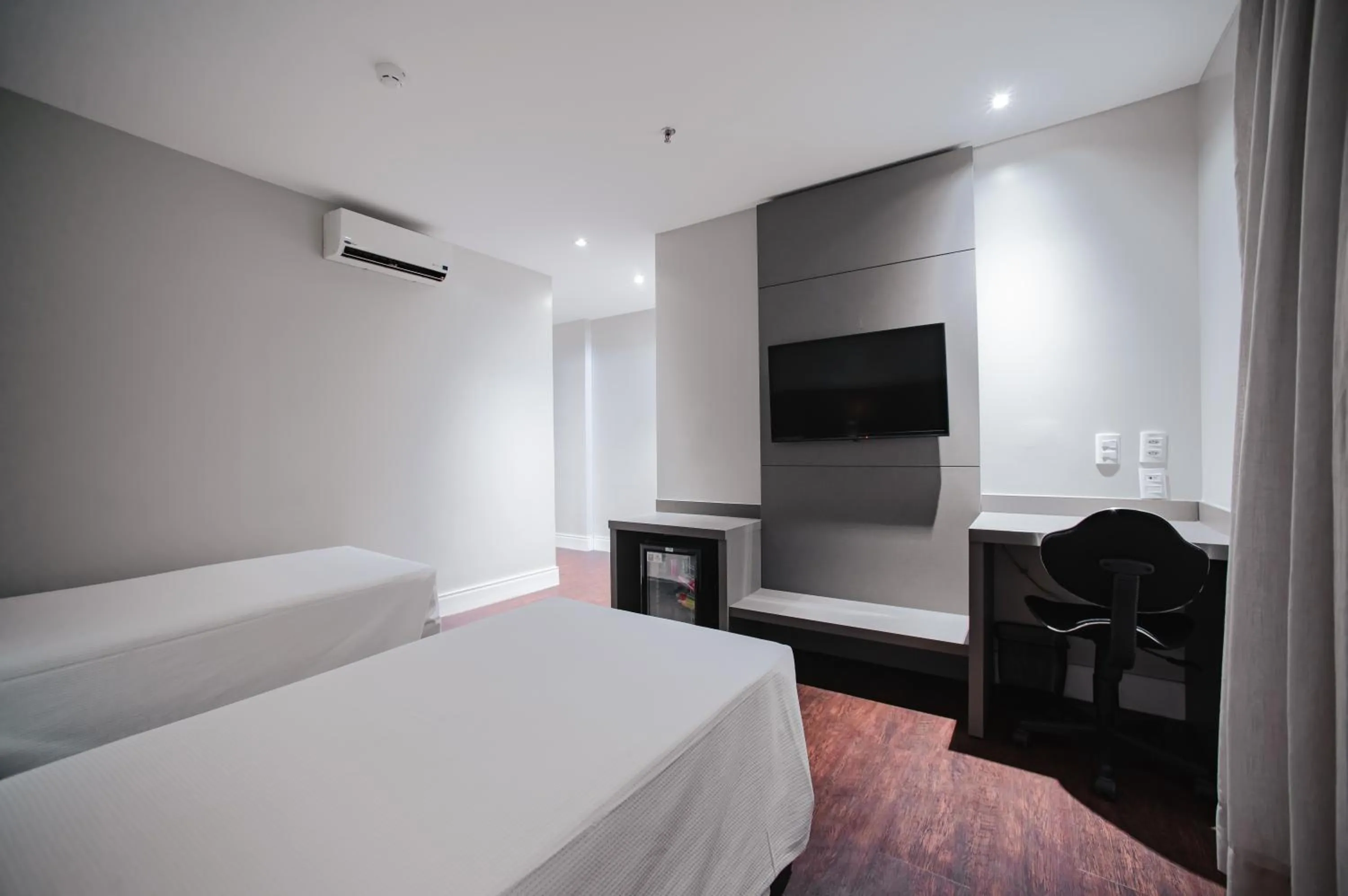 Bed in Brut by Slaviero Hotéis