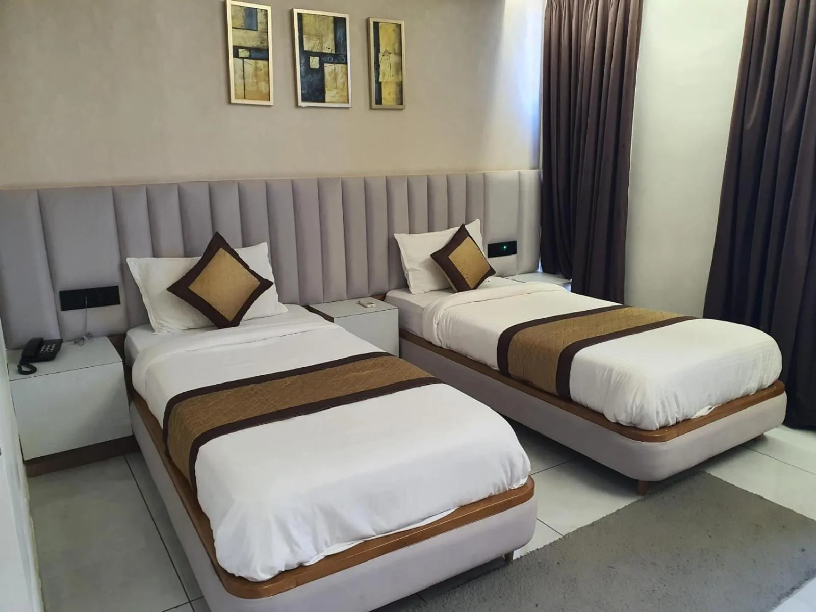 Bed in Hotel Royal Empire