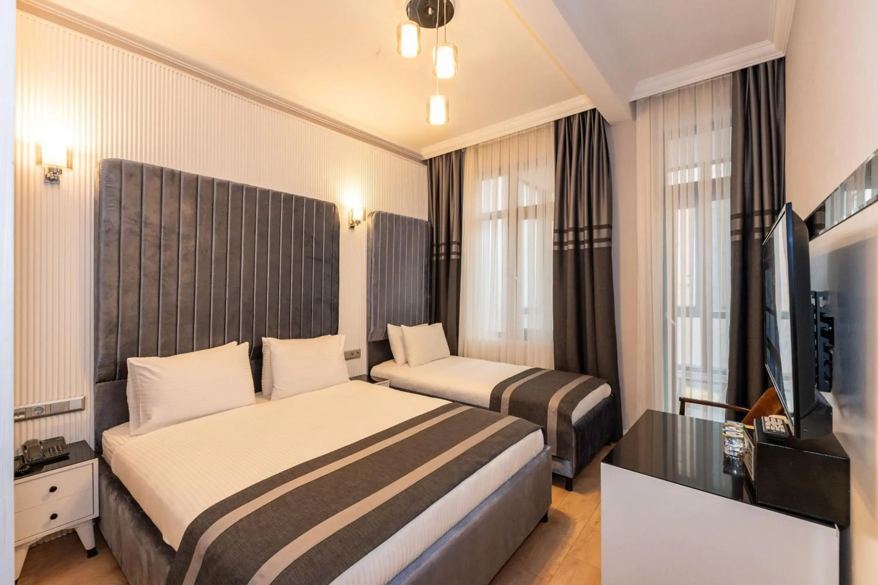 Deluxe Triple Room in The Now Hotel Deluxe Triple Room in The Now Hotel