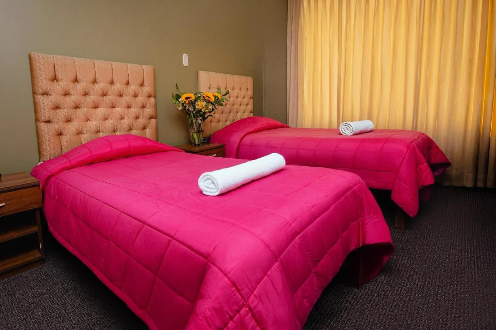 Bed in Hotel San Felipe Suites