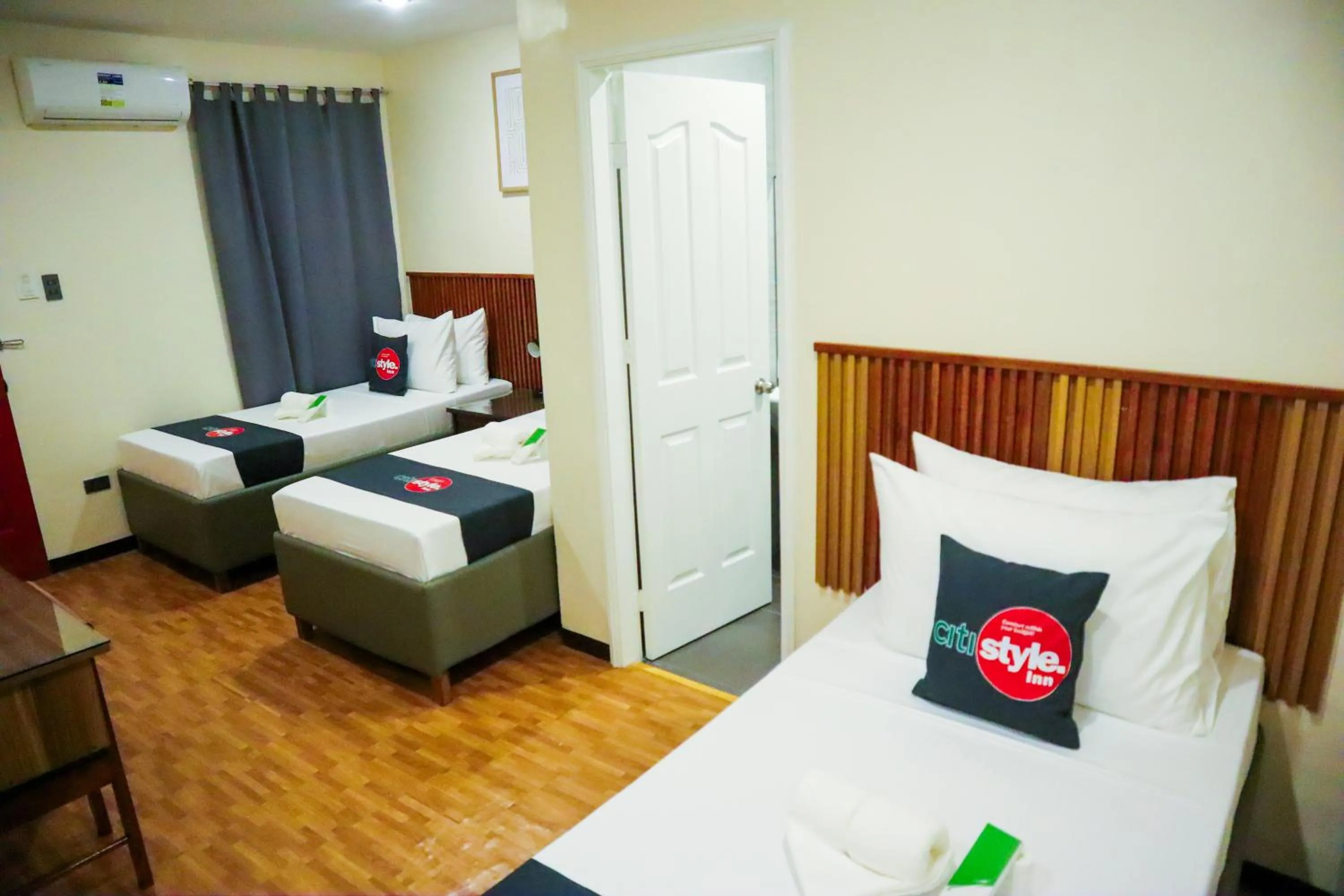 Bed in Citistyle Inn