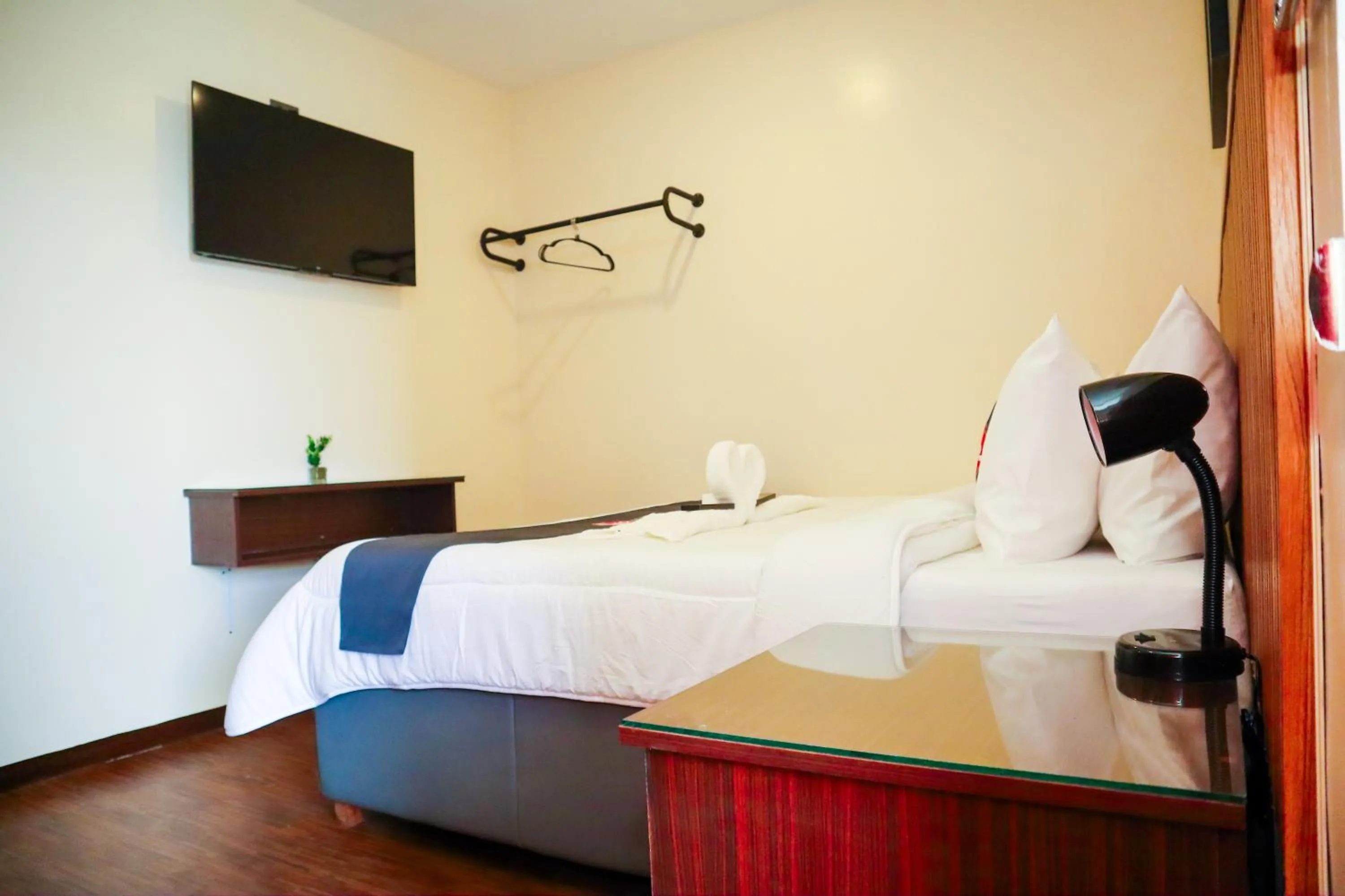 Bed in Citistyle Inn