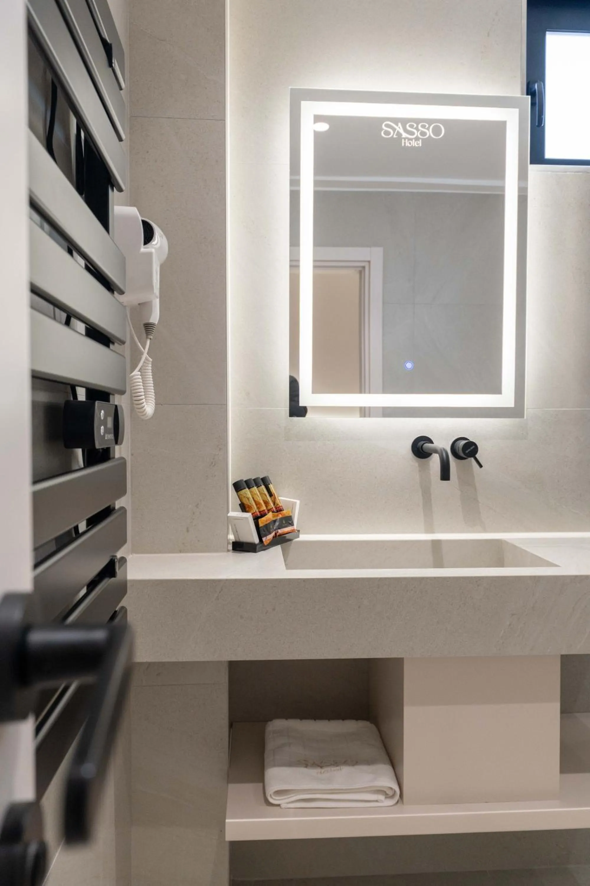 Bathroom in SASSO Hotel