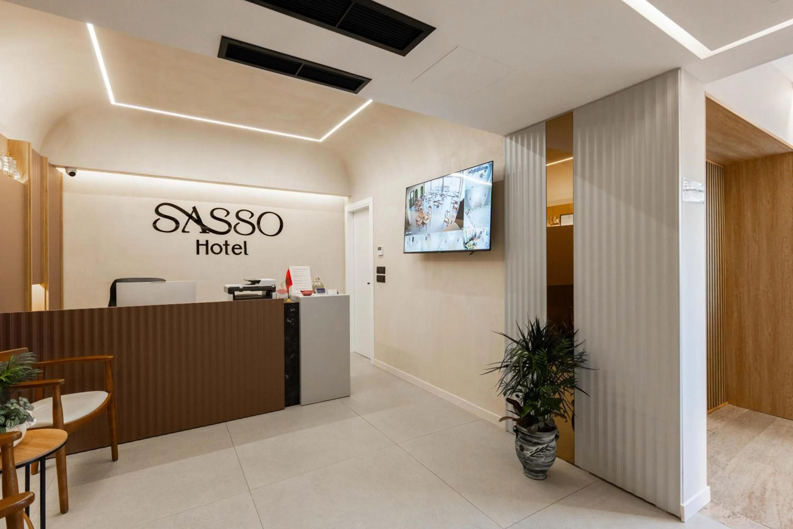 Property logo or sign in SASSO Hotel
