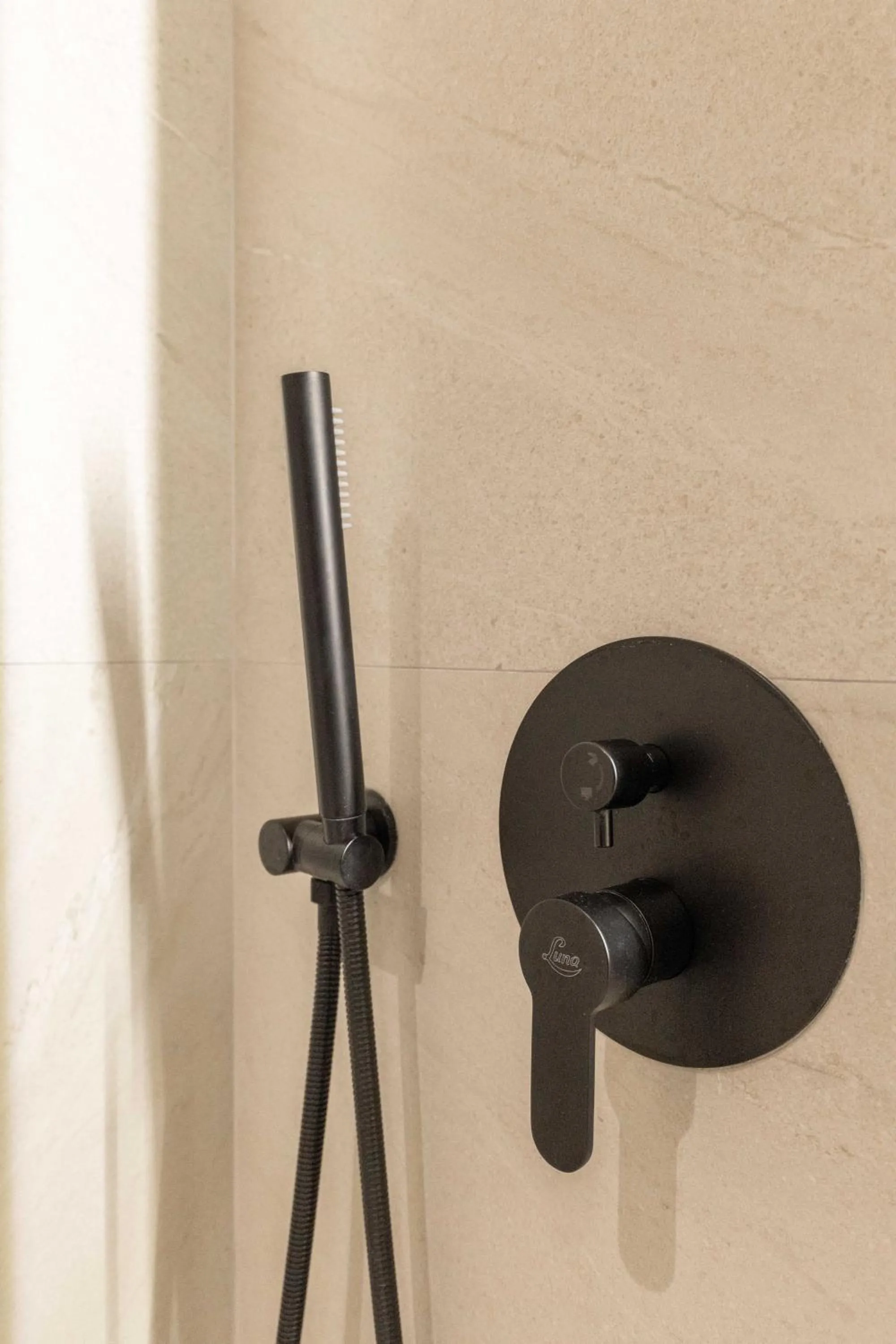 Bathroom in SASSO Hotel