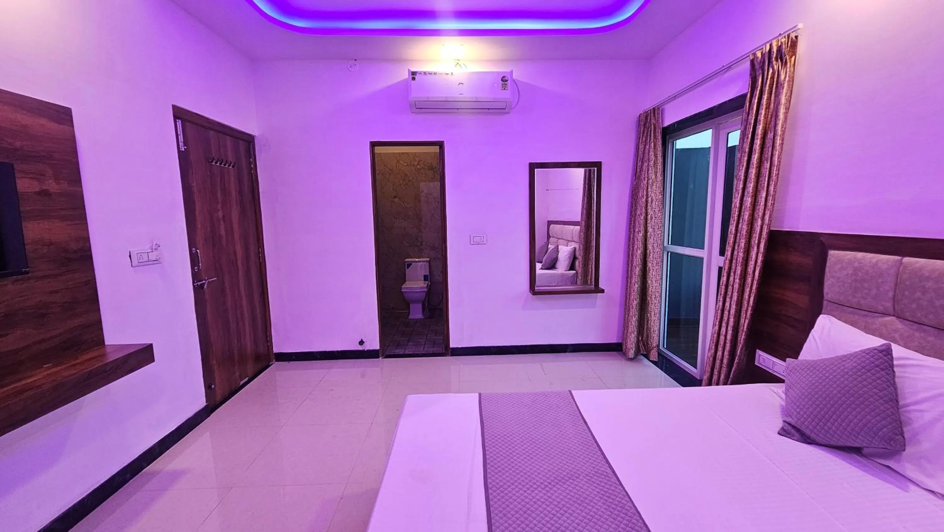 Bed in Braham Vatika Resort