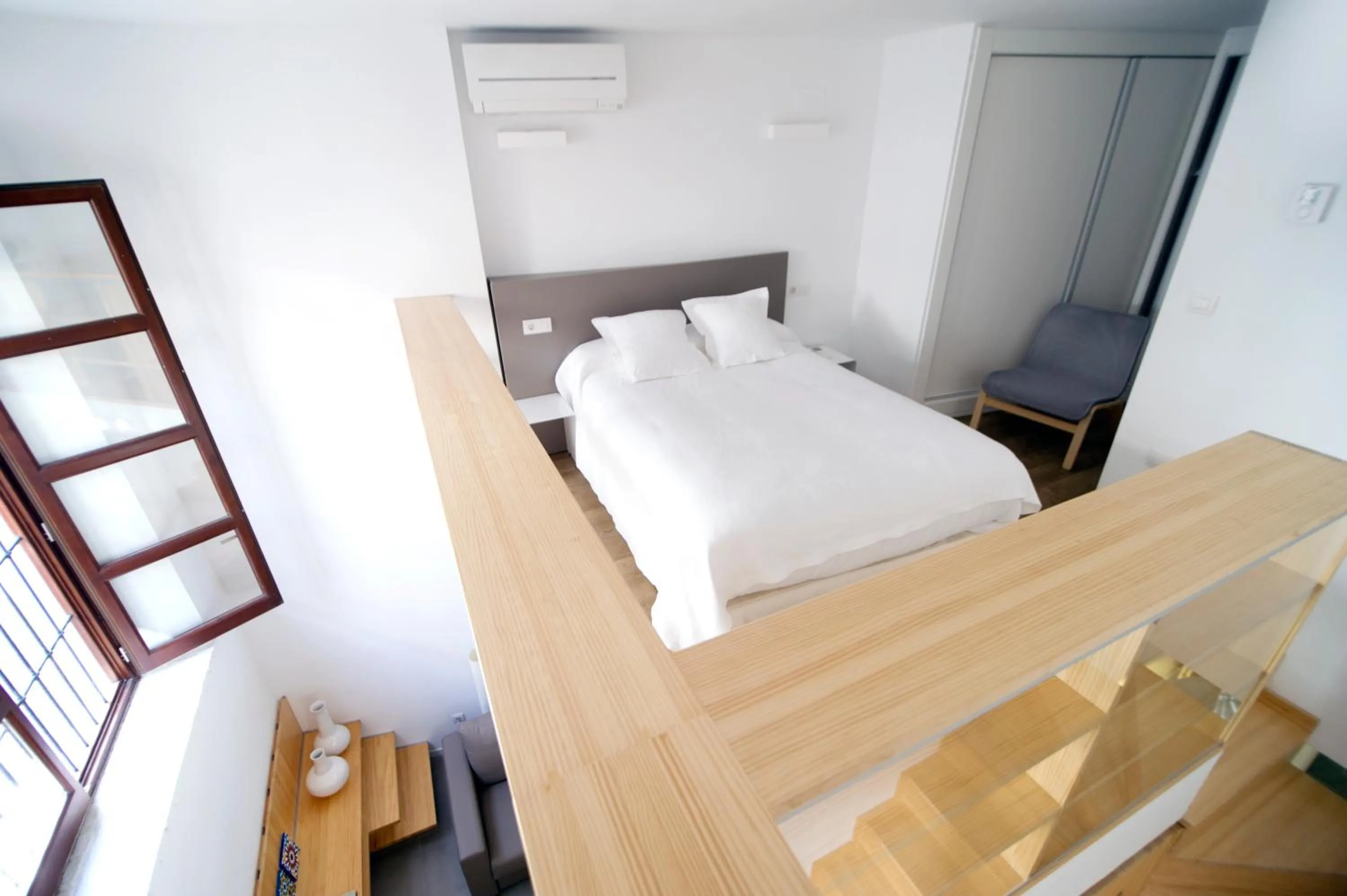 Bed in Smart Suites Albaicin