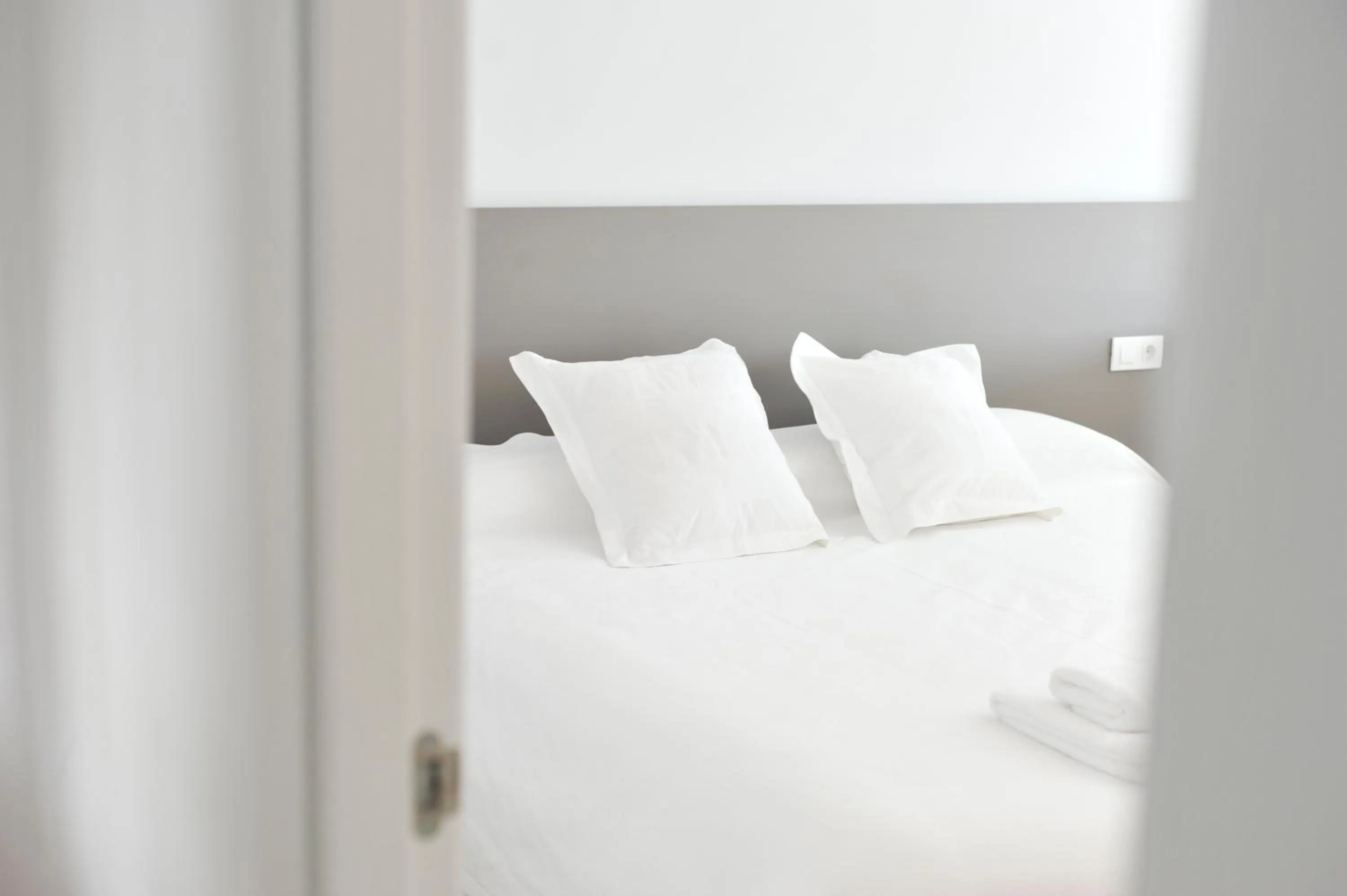 Bed in Smart Suites Albaicin