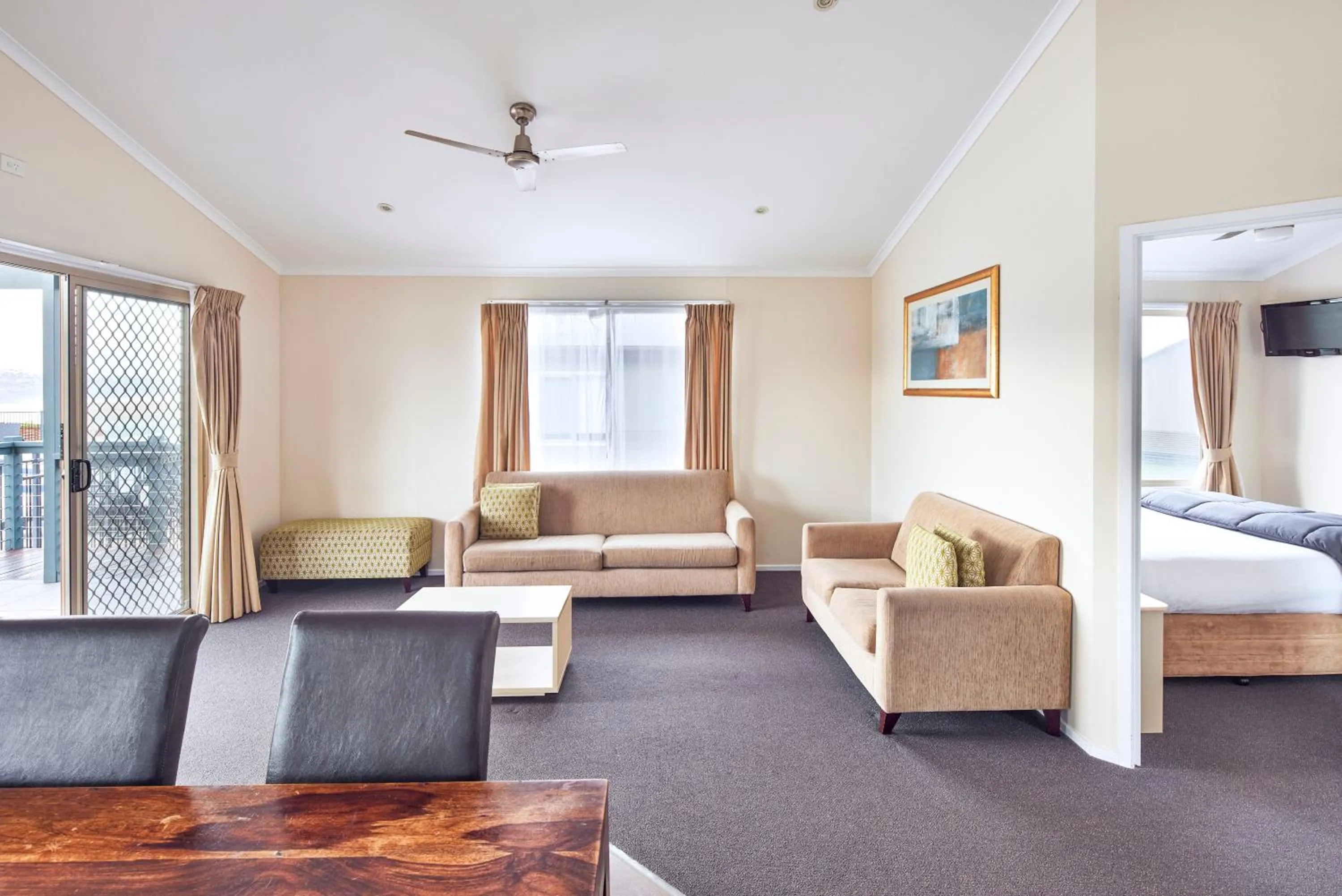 Seating area, Bed in NRMA Merimbula Beach Holiday Resort