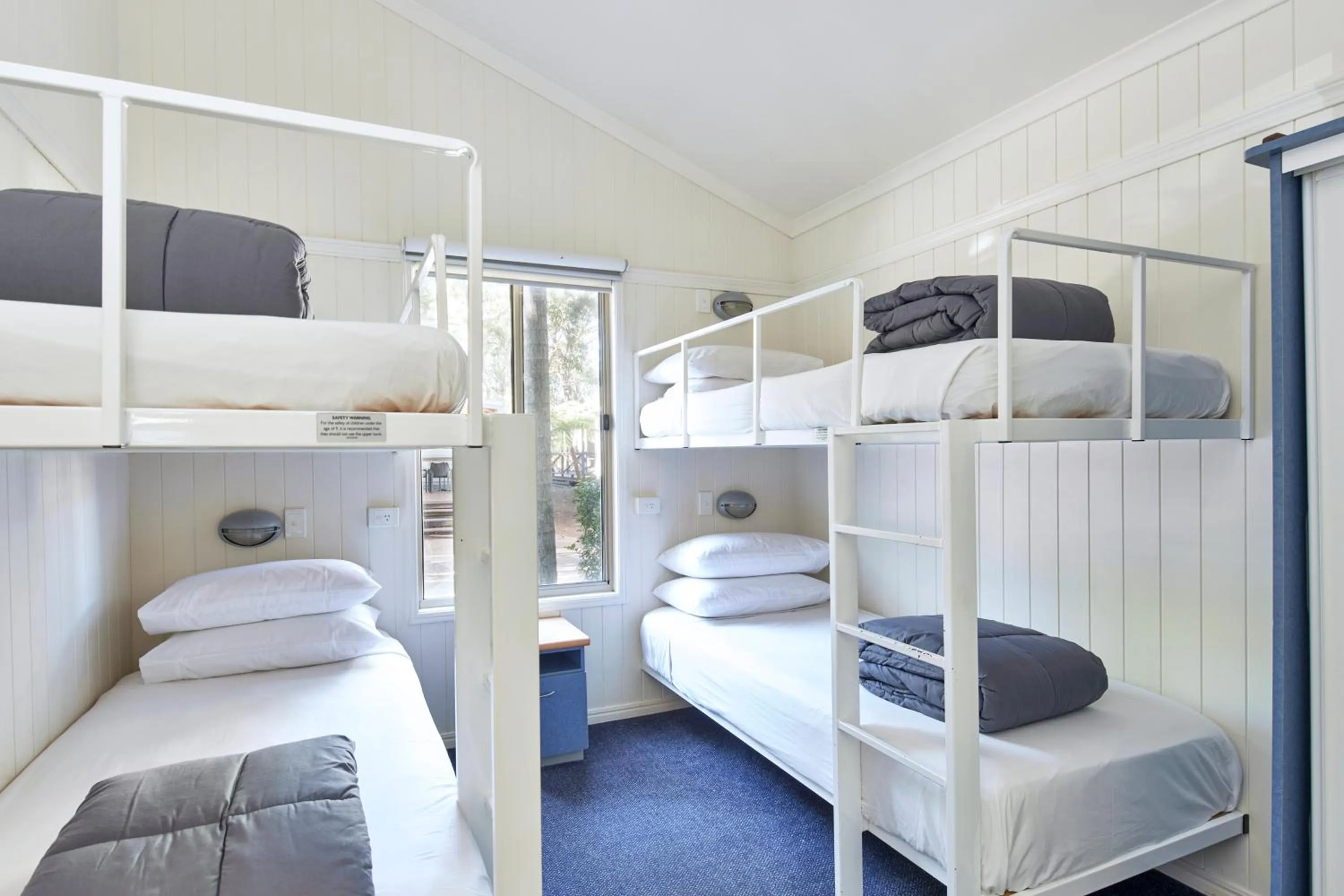 Bed in NRMA Ocean Beach Holiday Resort