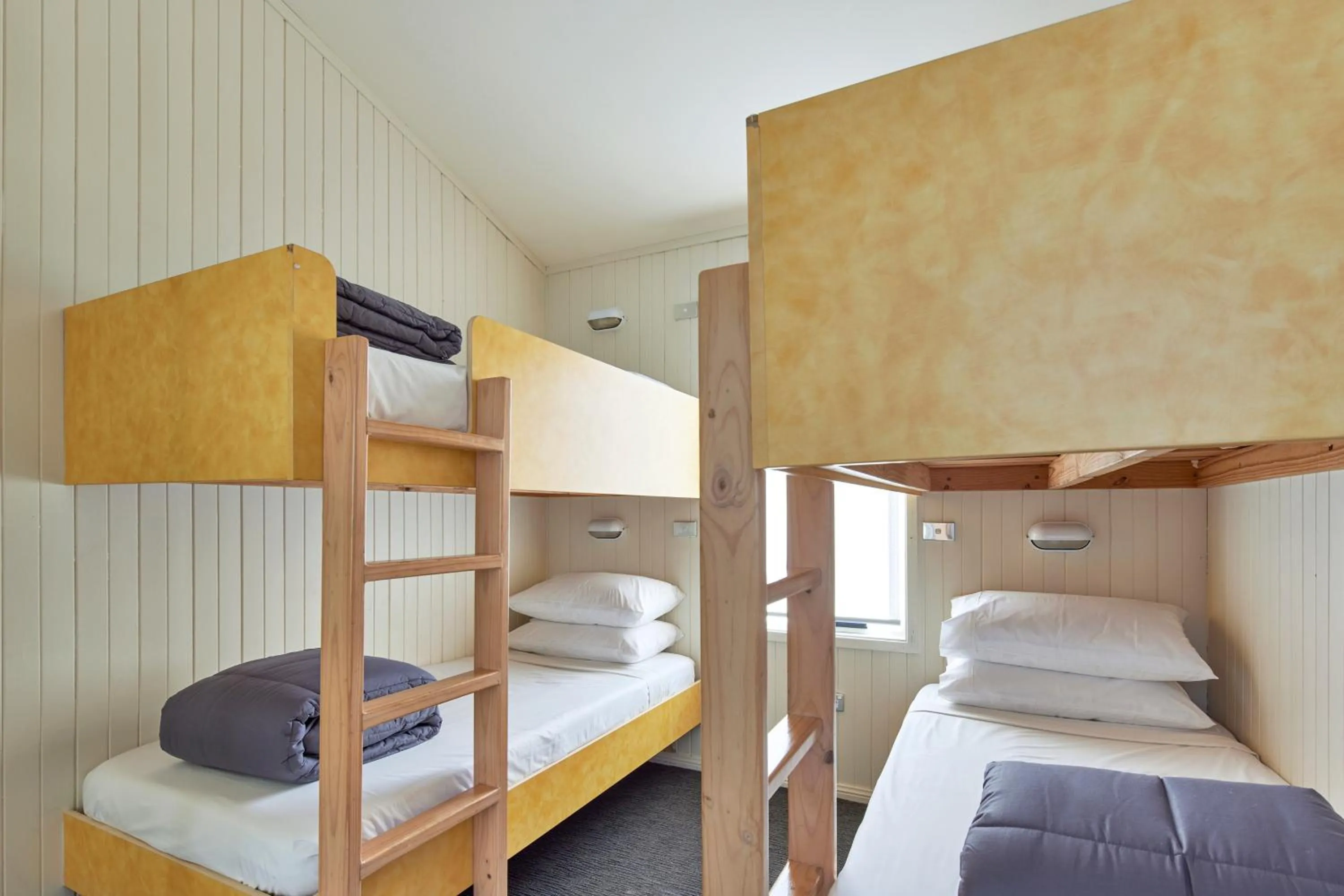 Bed in NRMA Ocean Beach Holiday Resort