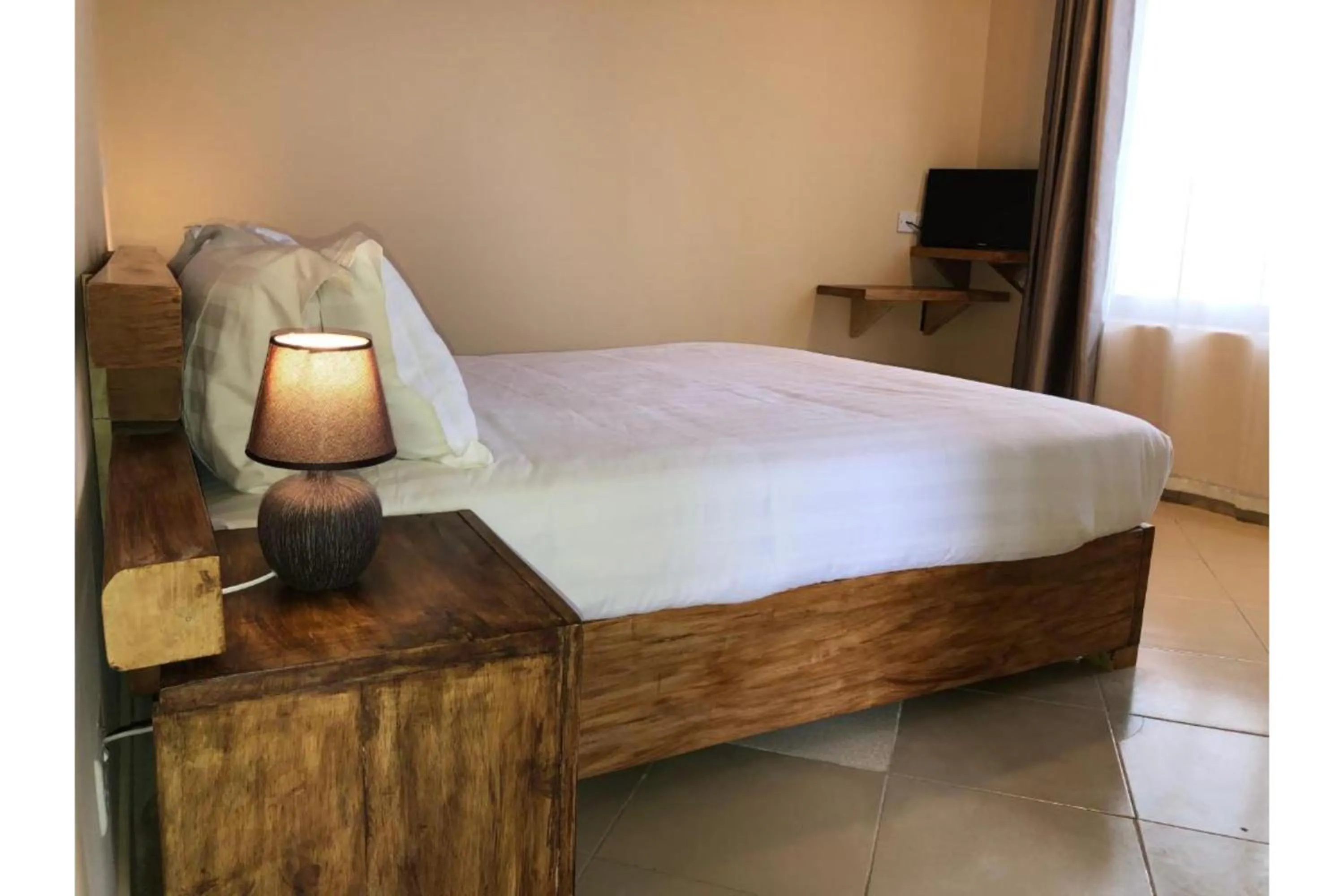 Bed in Meley Impala Hotel