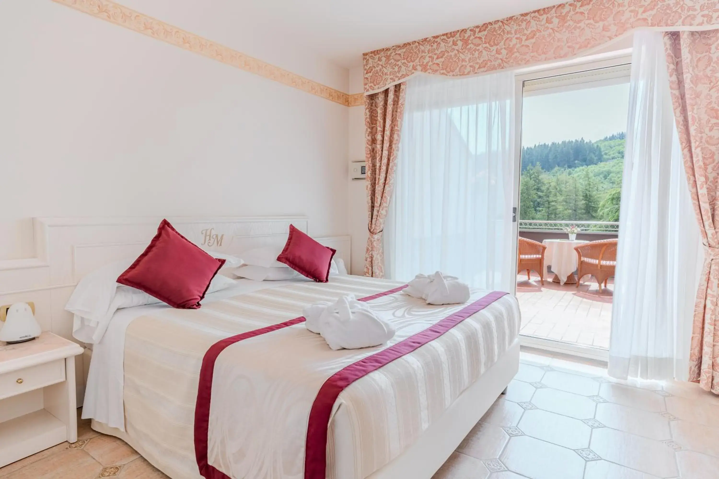 Superior Triple Room with Lake View in Hotel Miramonti Superior Triple Room with Lake View in Hotel Miramonti