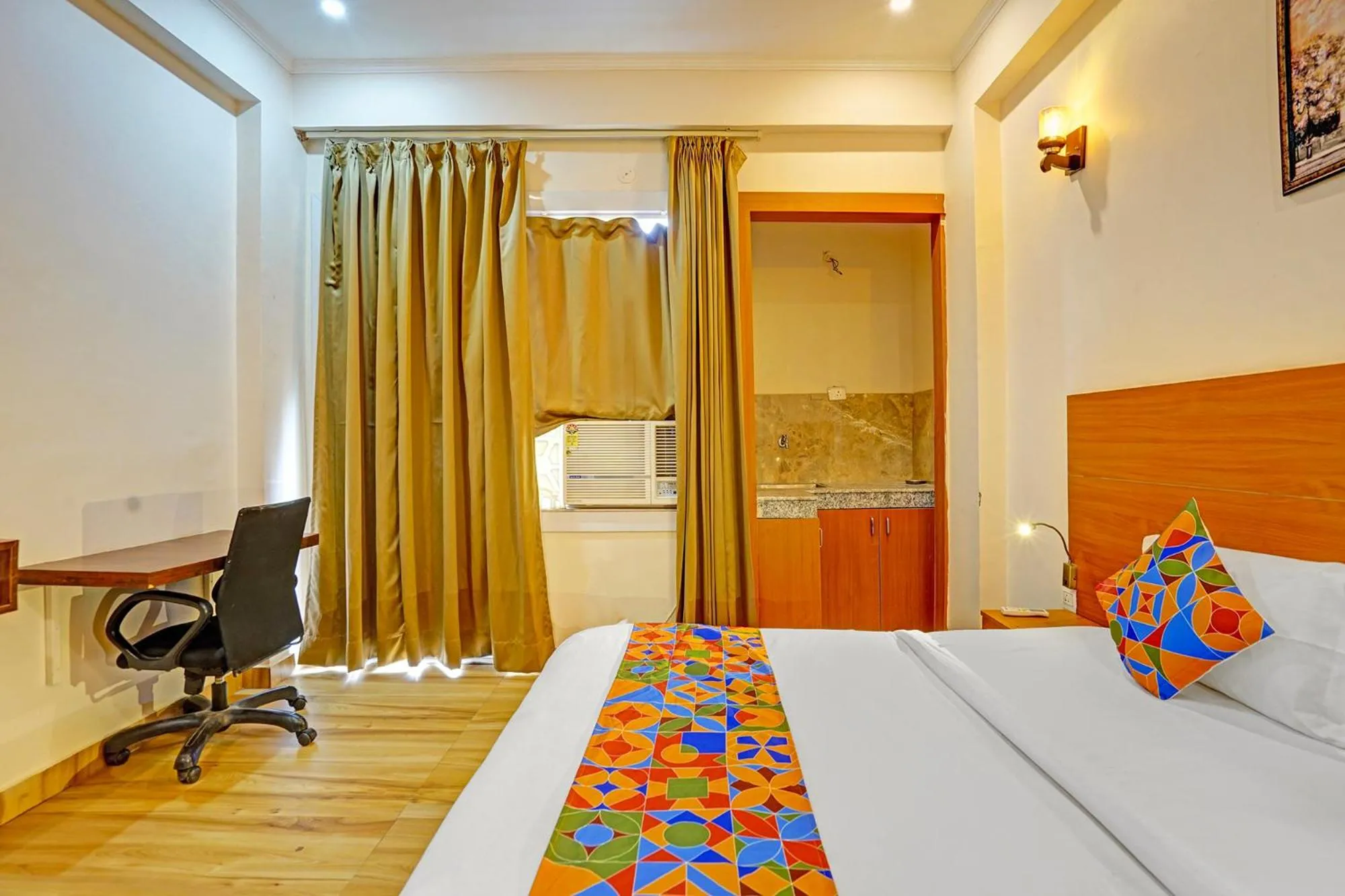 Bed in FabHotel The Viraaj - Gaur City Mall