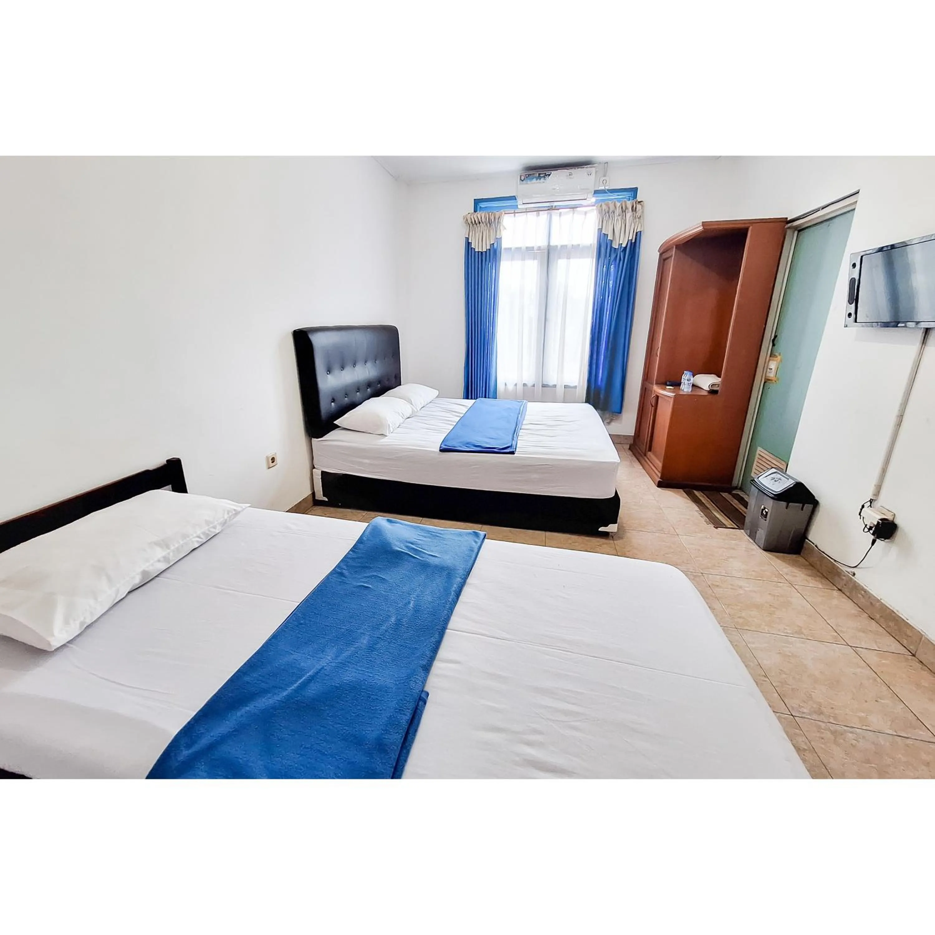 Bedroom, Bed in Wisma PKBI Jabar Mitra RedDoorz