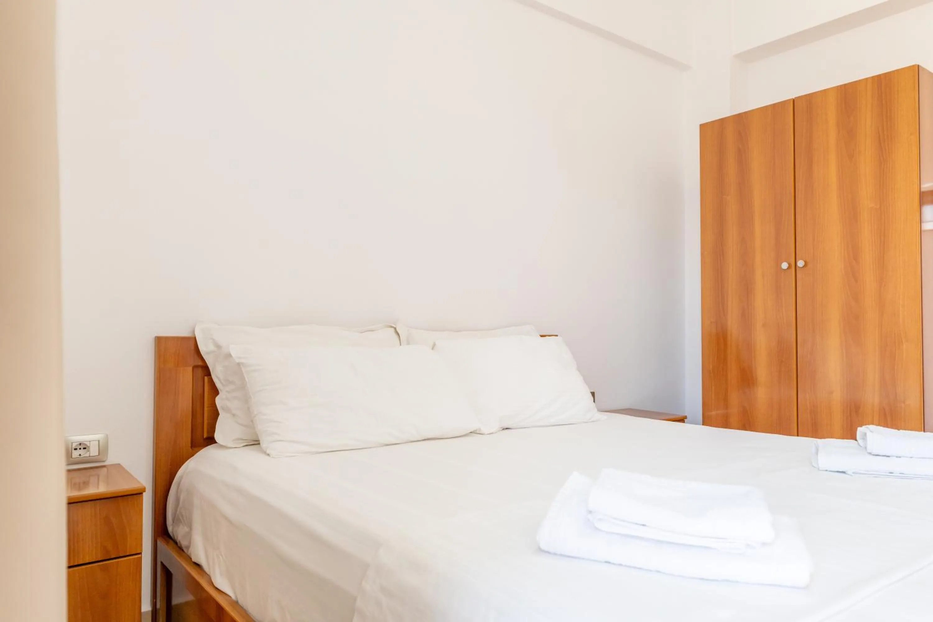 Bed in Aleksander ApartHotel