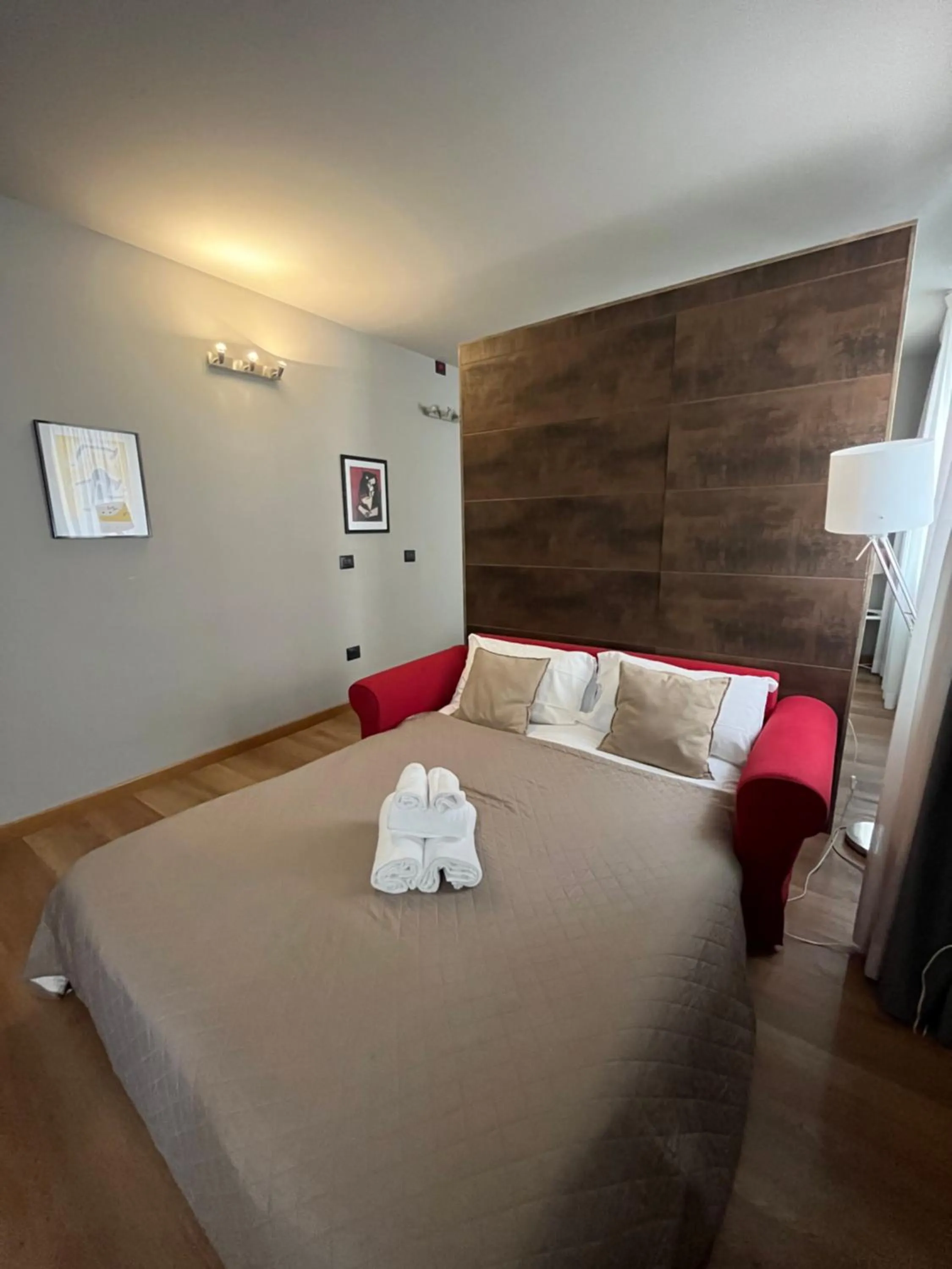 Bed in Apartment Hotel Marchesini