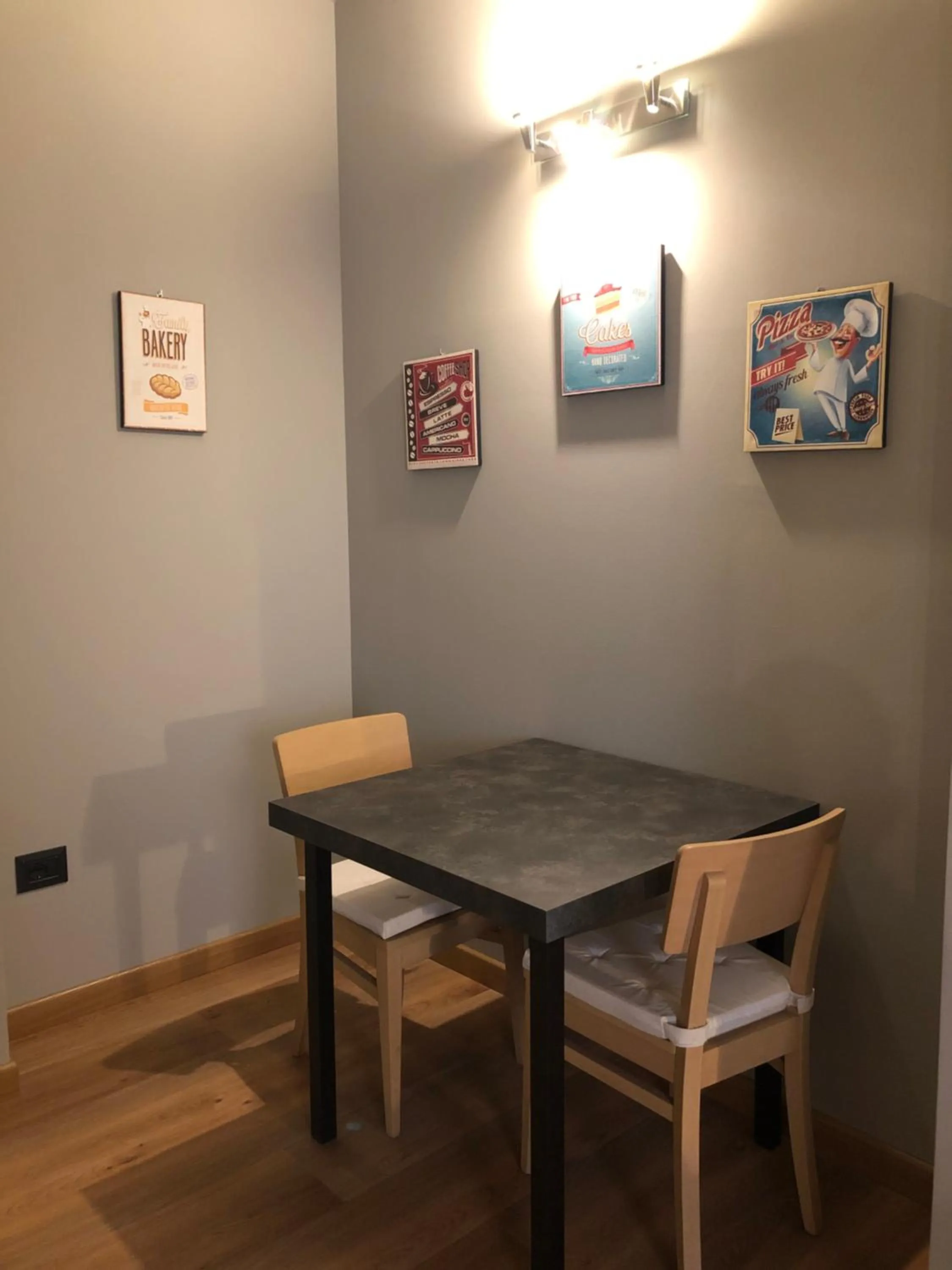 Dining area in Apartment Hotel Marchesini