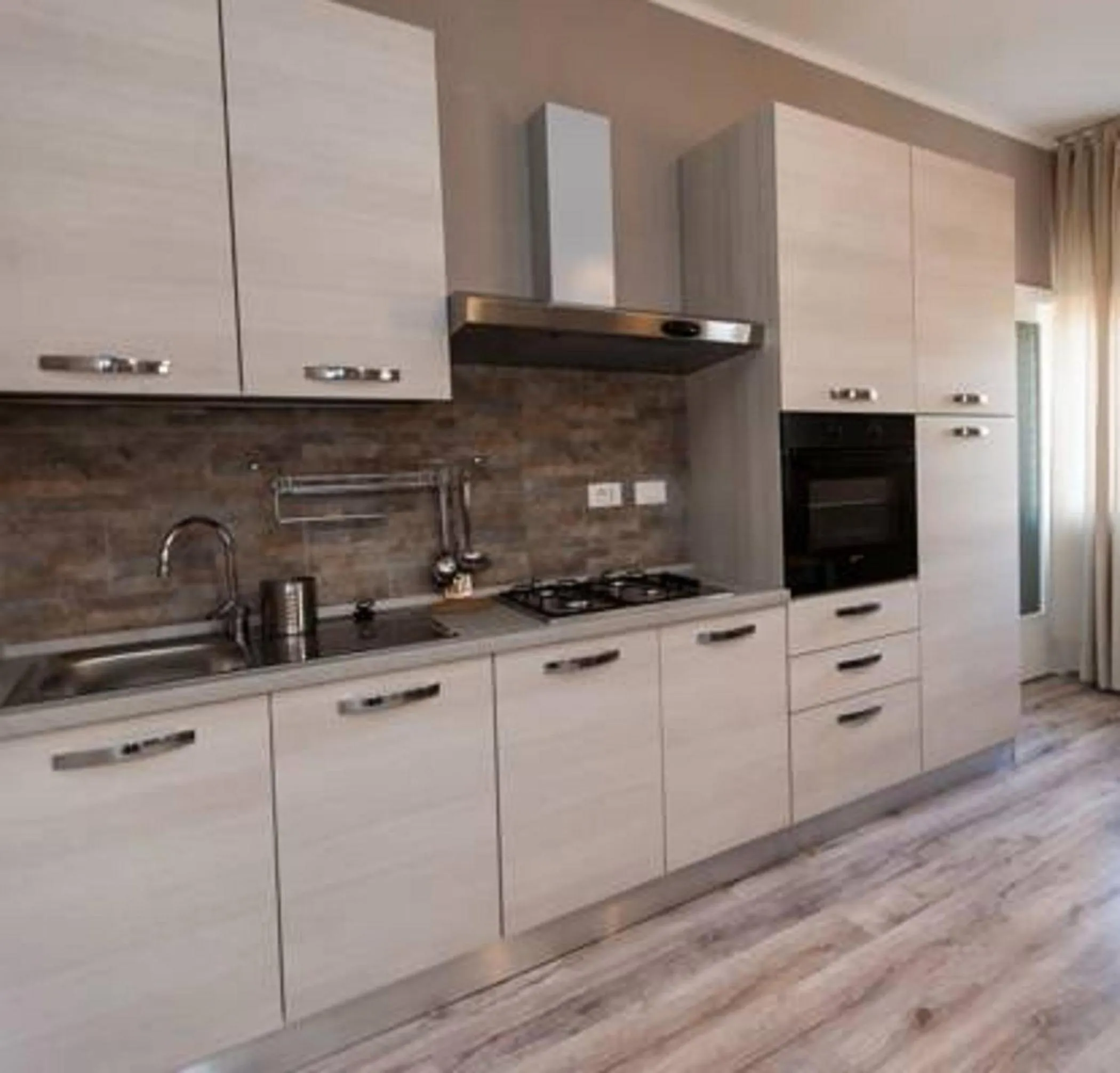 Kitchen or kitchenette in Apartment Hotel Marchesini
