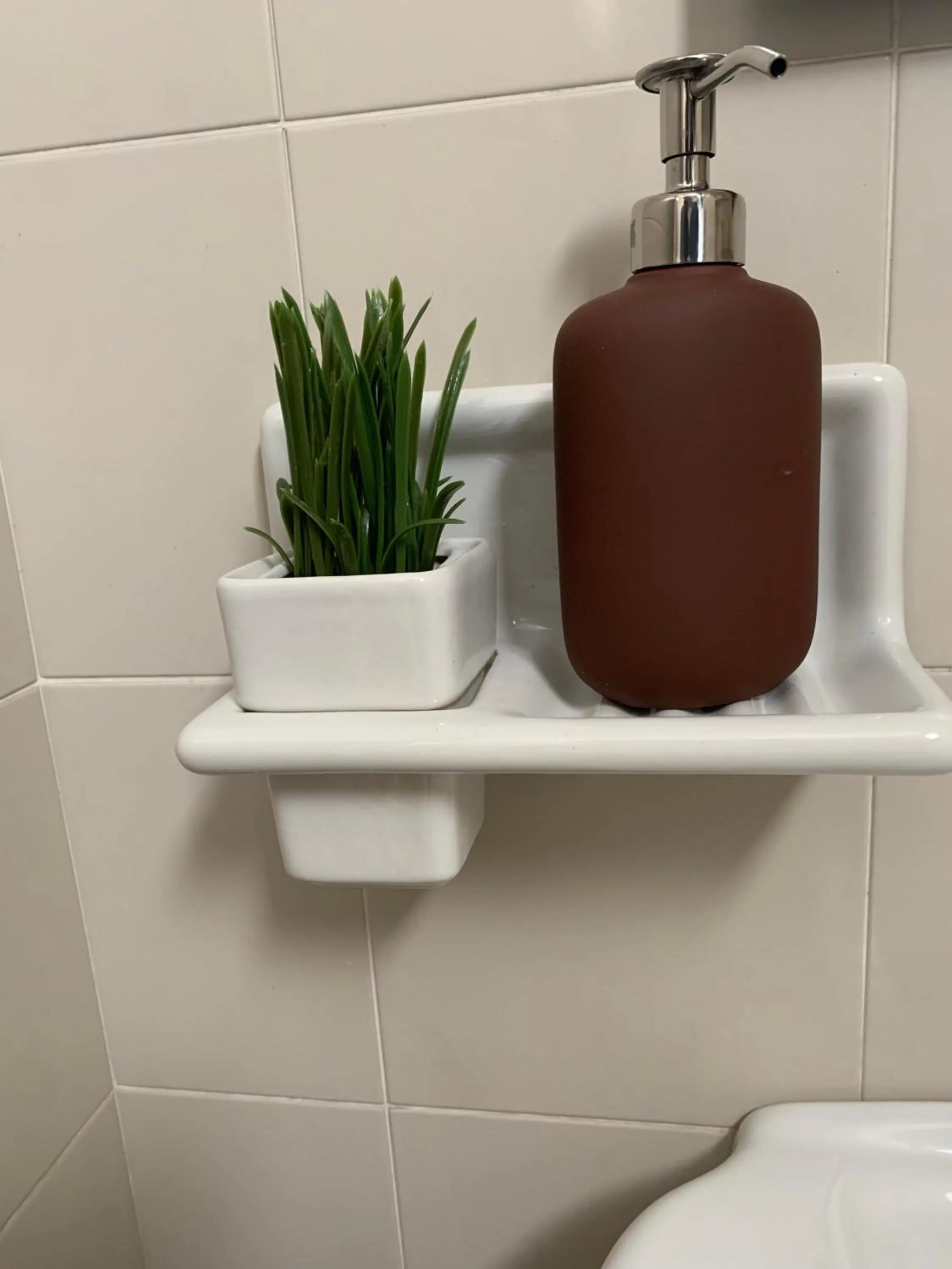 Bathroom in Apartment Hotel Marchesini