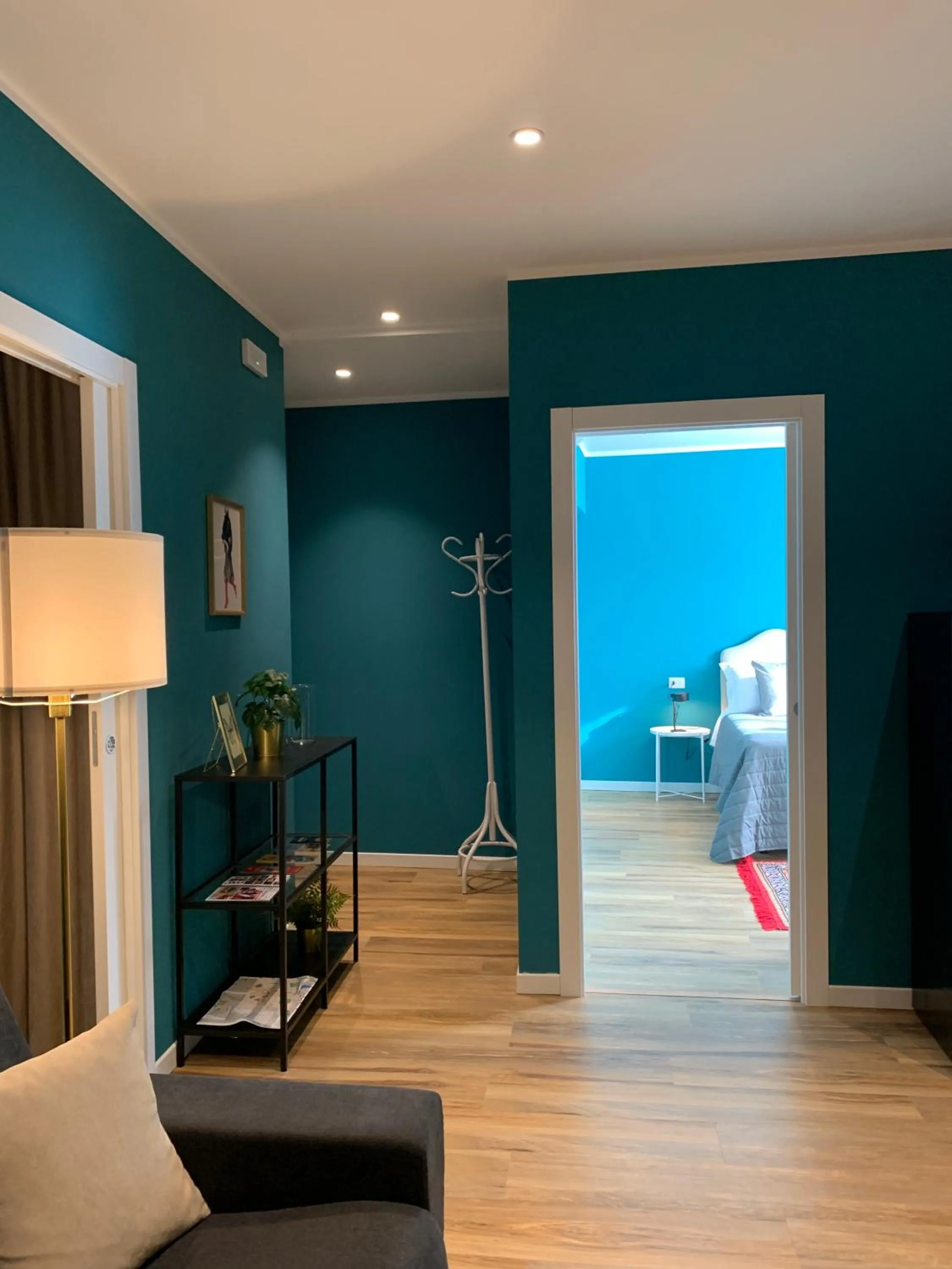 Living room, Bed in Apartment Hotel Marchesini