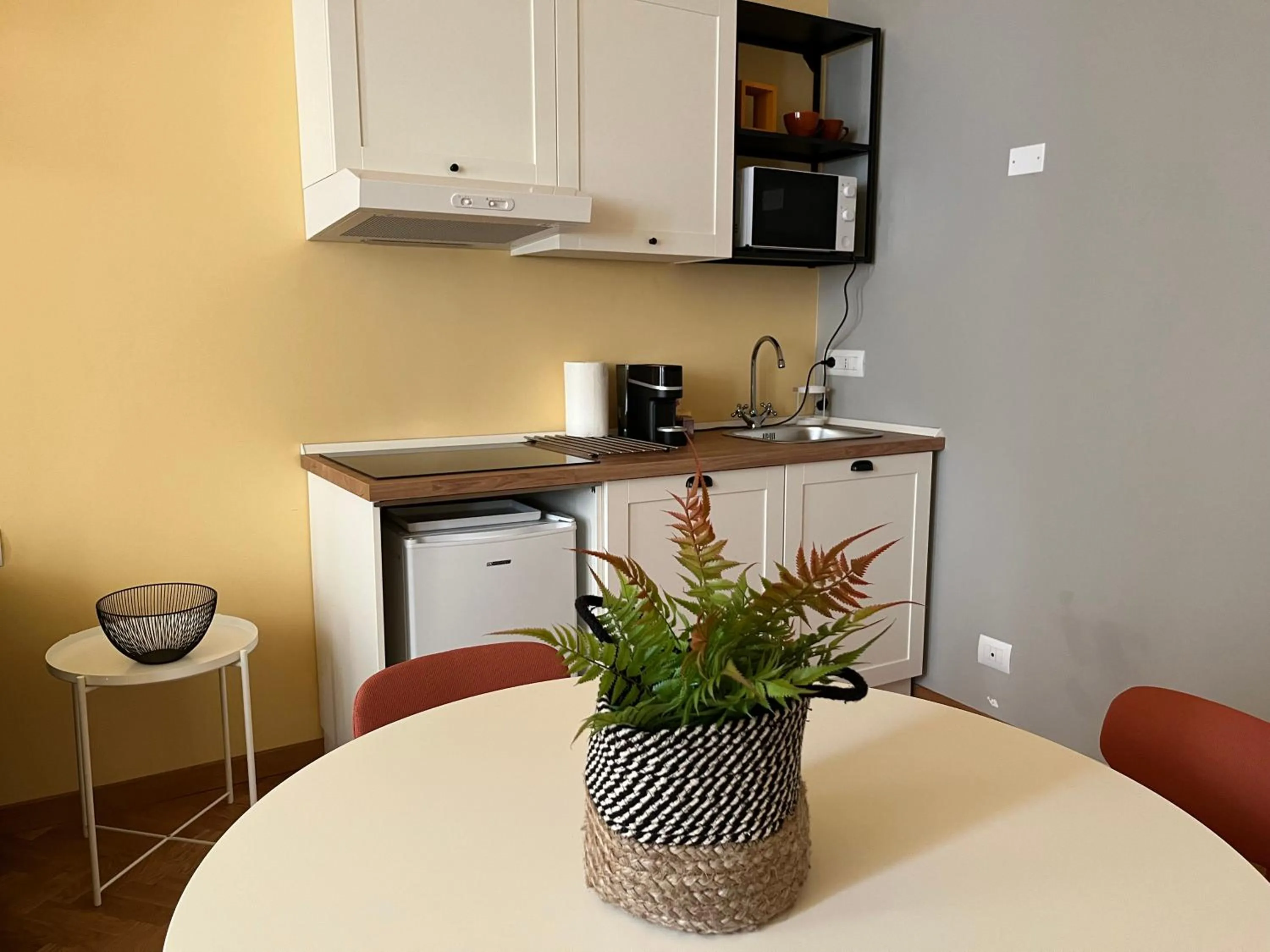Coffee/tea facilities in Apartment Hotel Marchesini