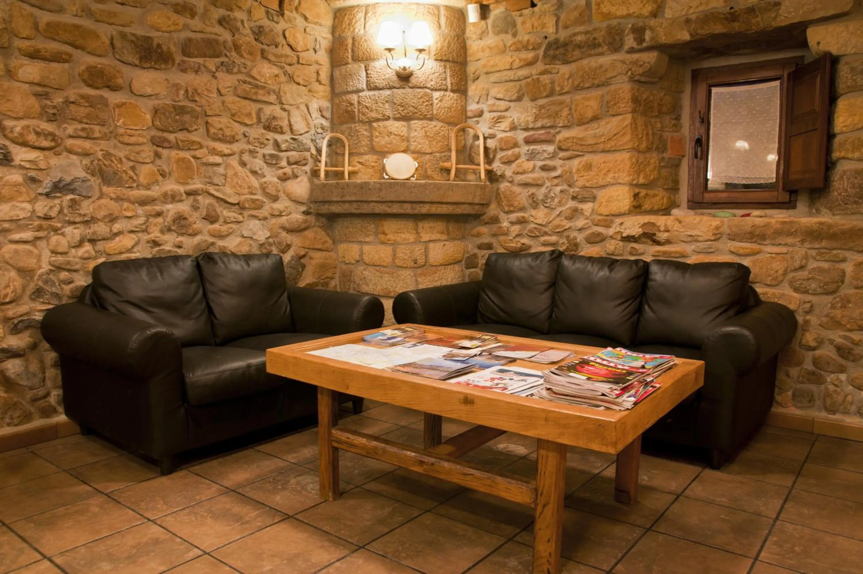 Communal lounge/ TV room in Posada Casa Rosalia