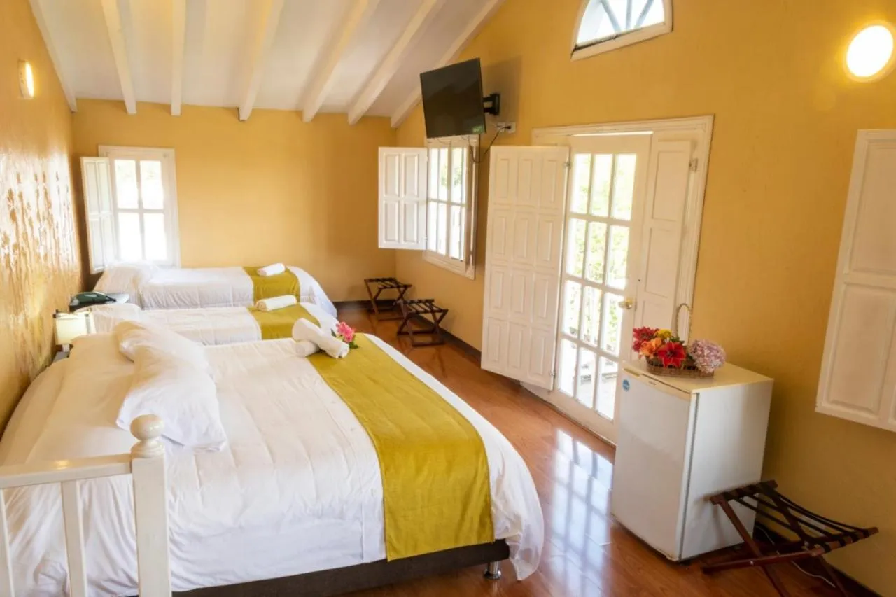 Photo of the whole room, Bed in San Agustin Internacional Hotel