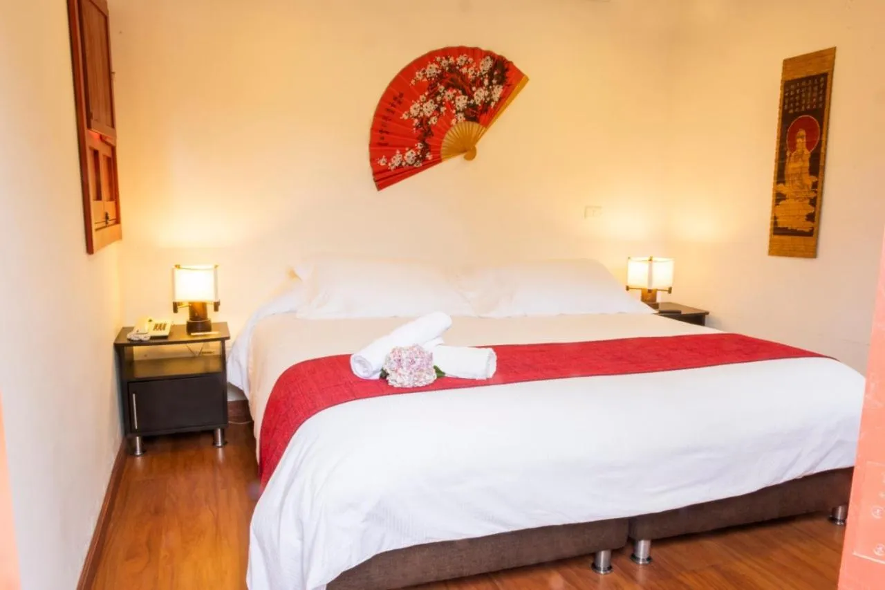 Photo of the whole room, Bed in San Agustin Internacional Hotel