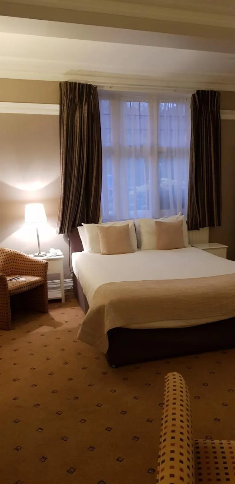 Bed in The Tudor Hotel