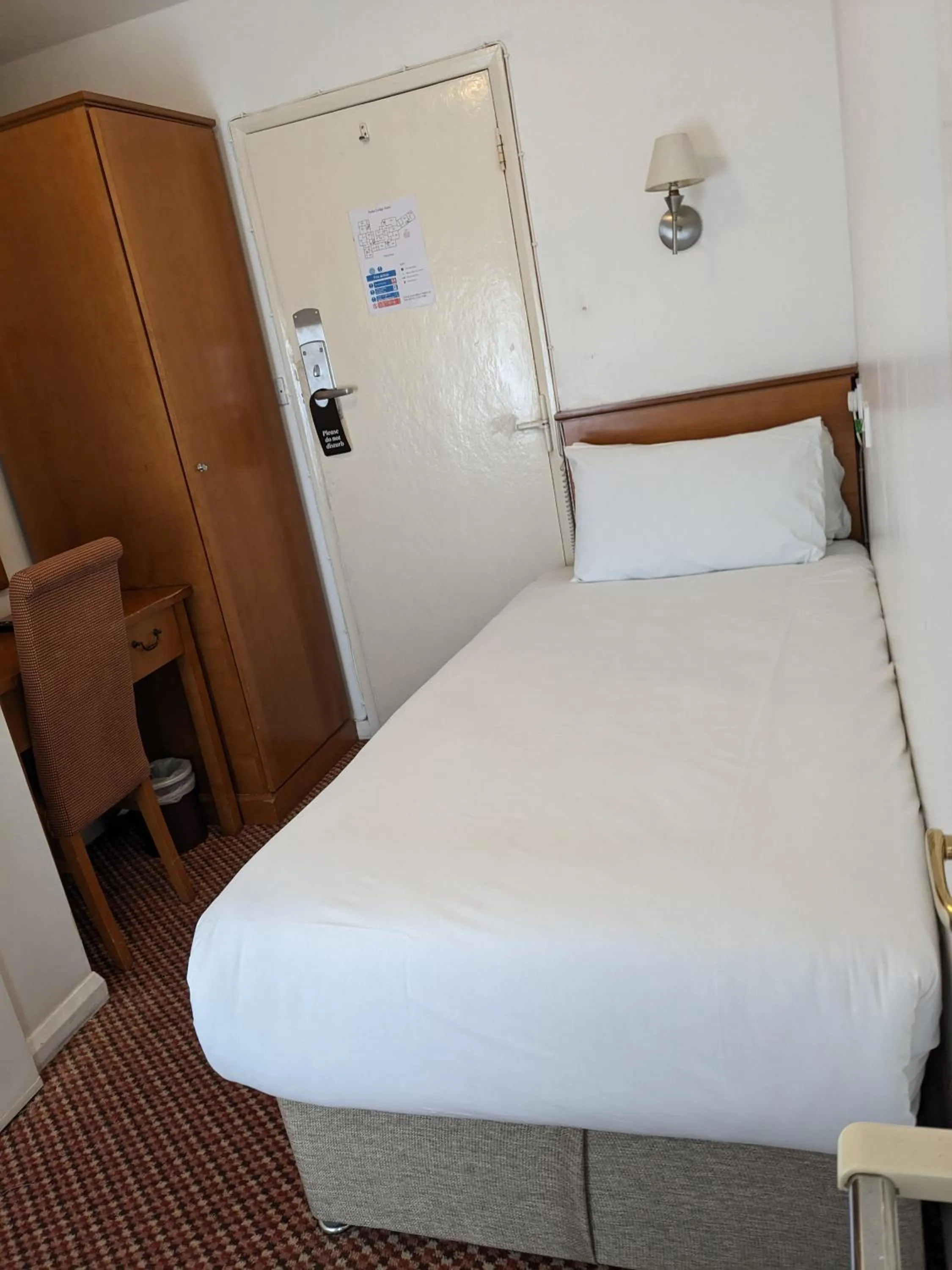 Bed in The Tudor Hotel